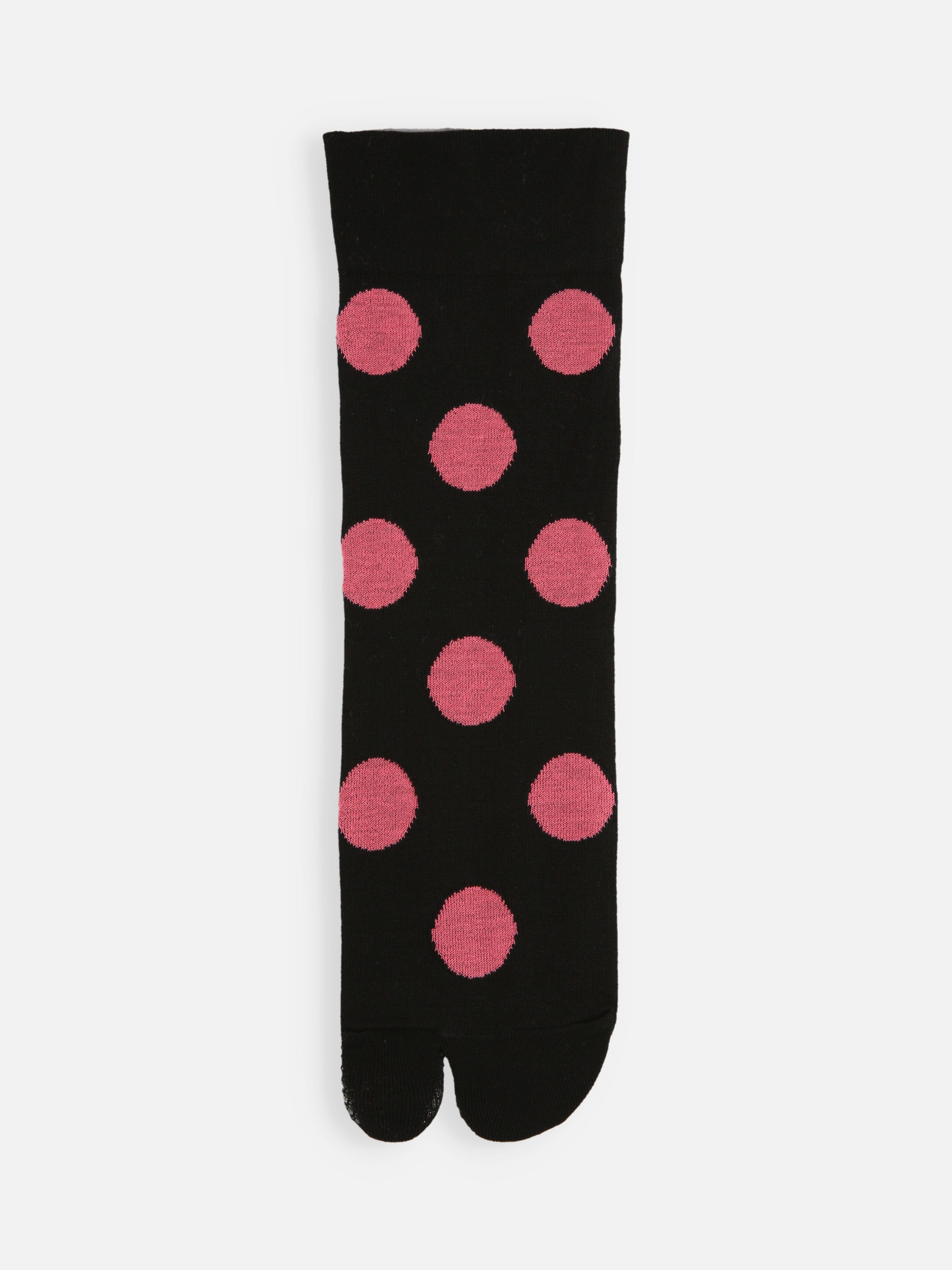 Tabio Big Dots Tabi Socks featuring a black design with pink oversized dots, showcasing a top view for detailed style.