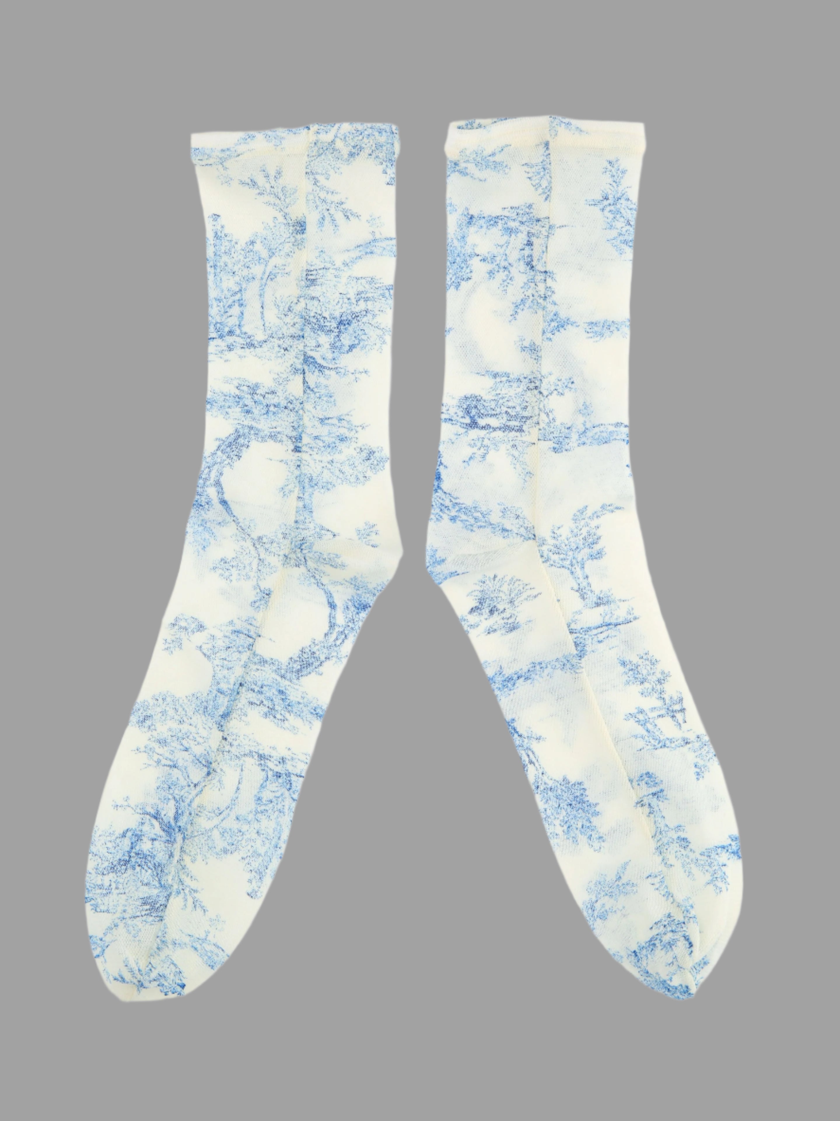 Tabio. Sheer Toile De Jouy Crew Socks in blue floral design; tulle fabric with elastic edge, front view showcasing pattern.