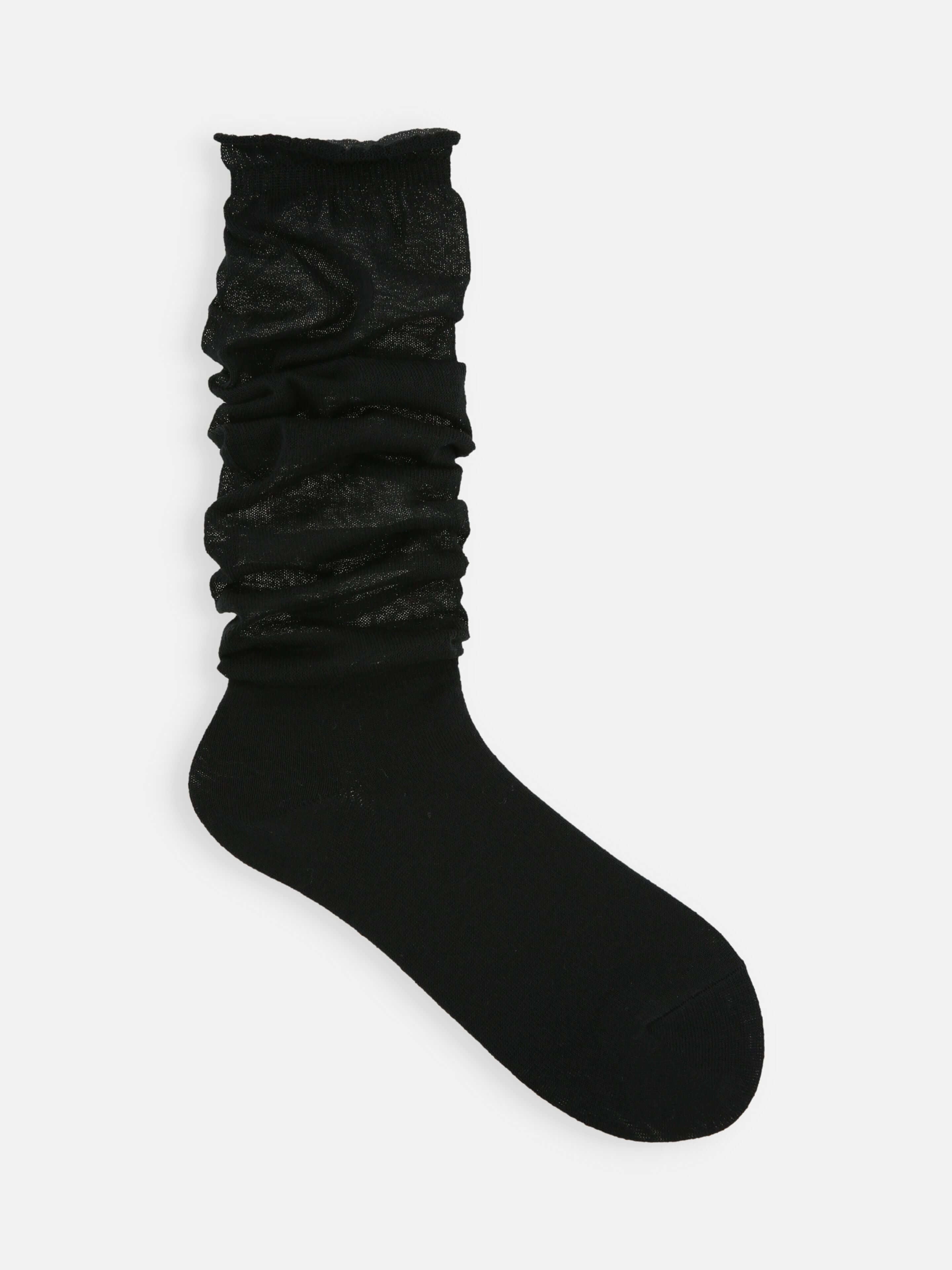Tabio Loose-Style Light Knee High Socks, black, front view; delicate, sheer texture ideal for sneakers or loafers.