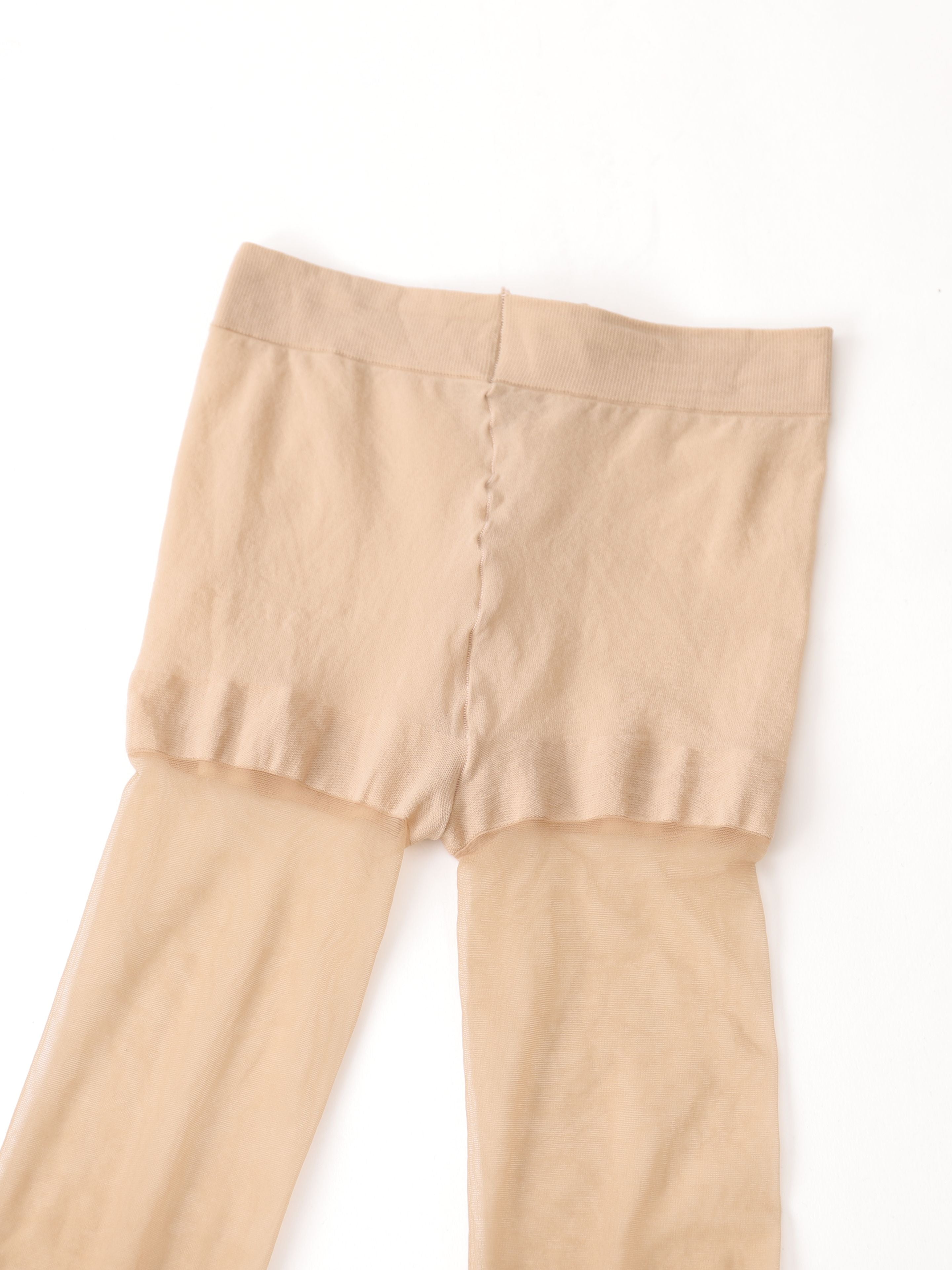 Tabio 20D Sheer Tights detail front flat lay of nude waistband and panty section with center seam.