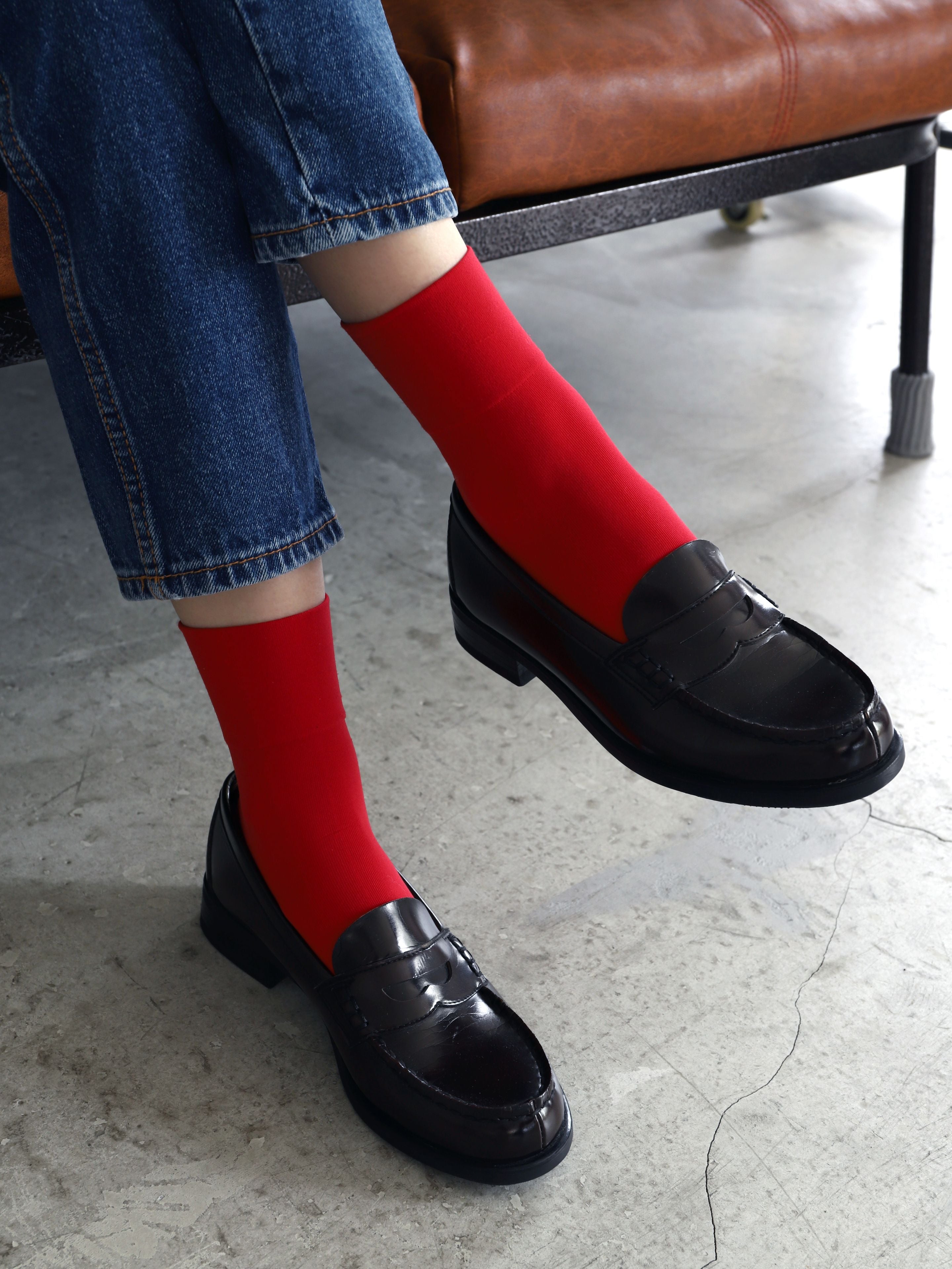 Tabio Soft Nylon Socks in vibrant red, showcasing a close-up on model wearing with black loafers and denim. Soft and.