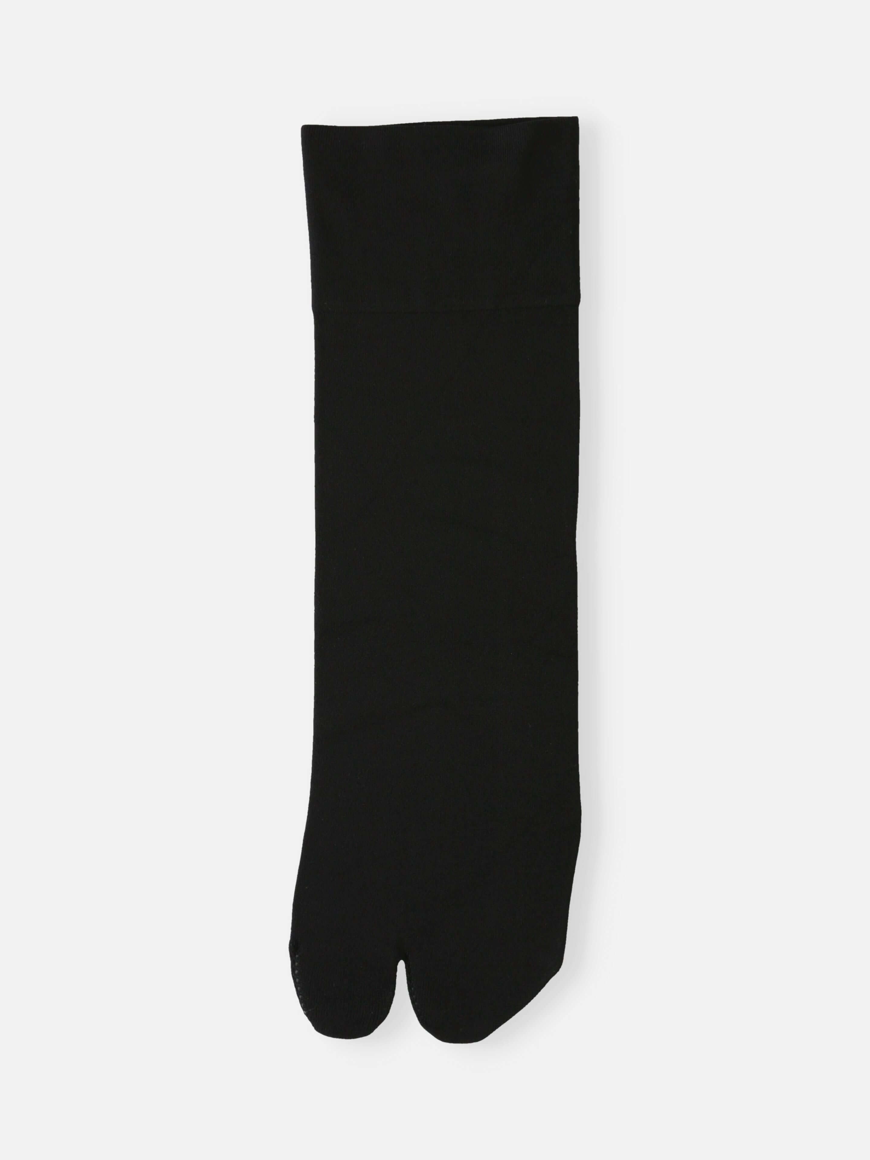 Tabio Soft Nylon Low Crew Tabi Socks in black, flat front view. Stretchy knit with deodorant-treated nylon.
