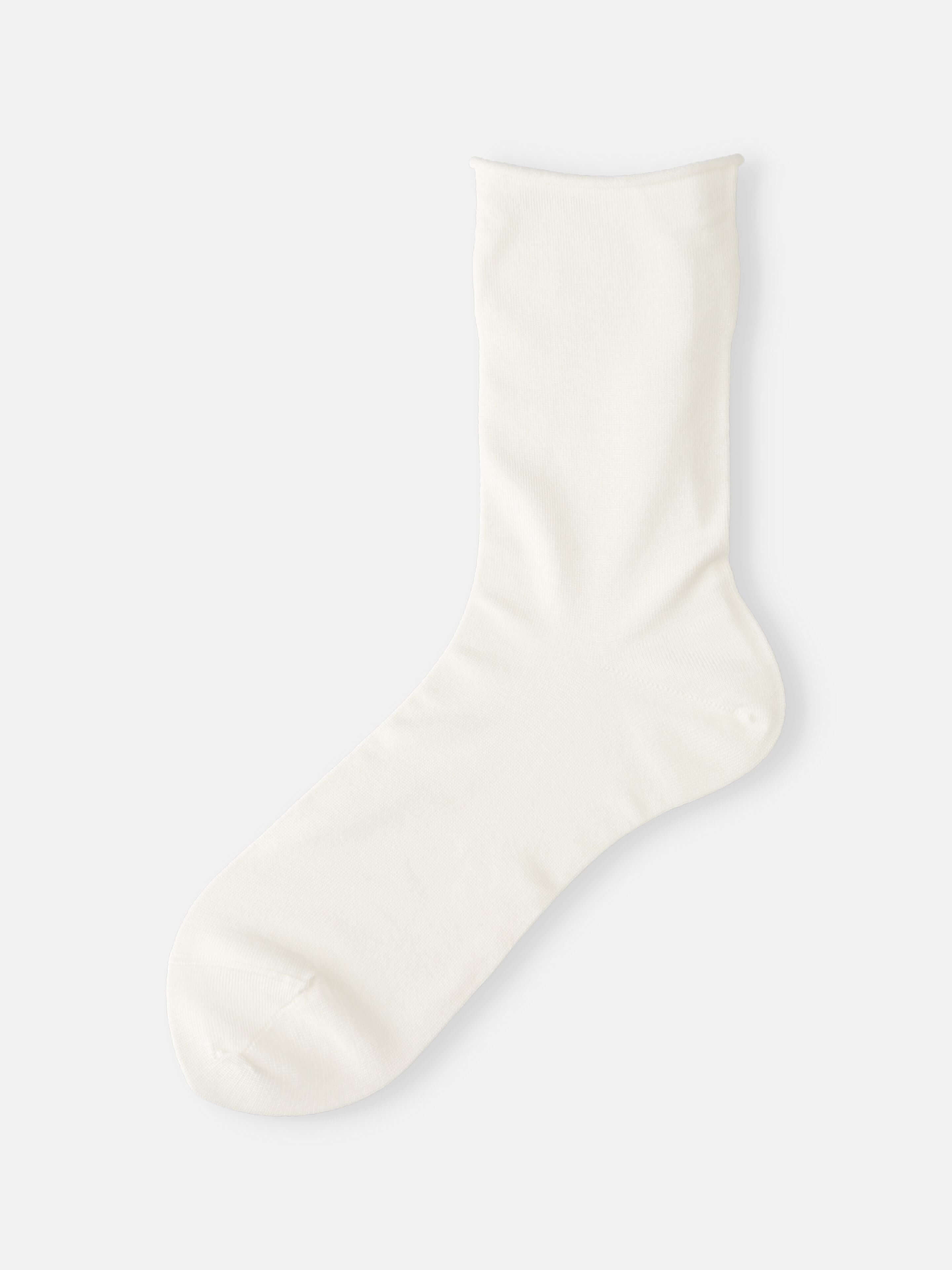 Tabio Premium Silk Plain Soft Low Crew Socks in soft white, showcasing a seamless design and luxurious silk texture.