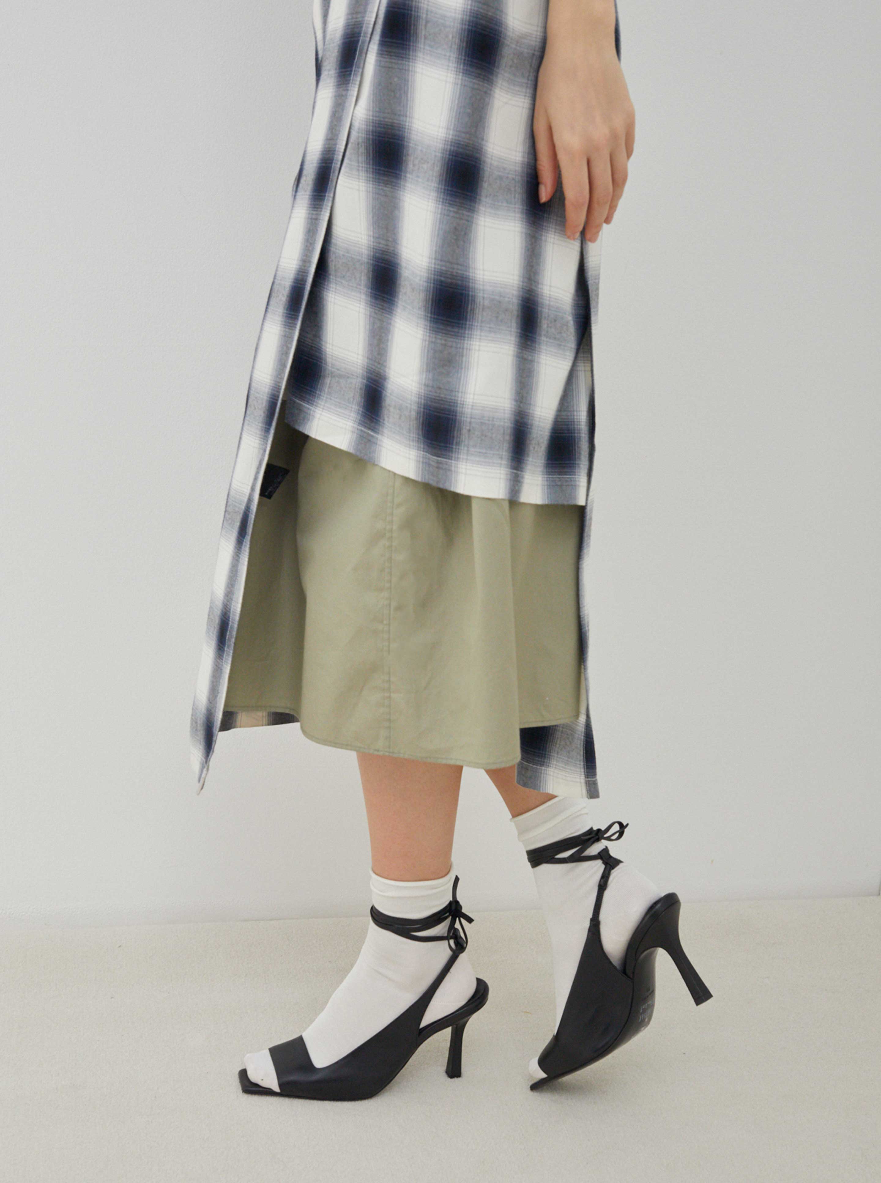 Tabio Premium Silk Plain Soft Low Crew Socks worn with a stylish outfit, showcasing the soft fabric and elegant design.