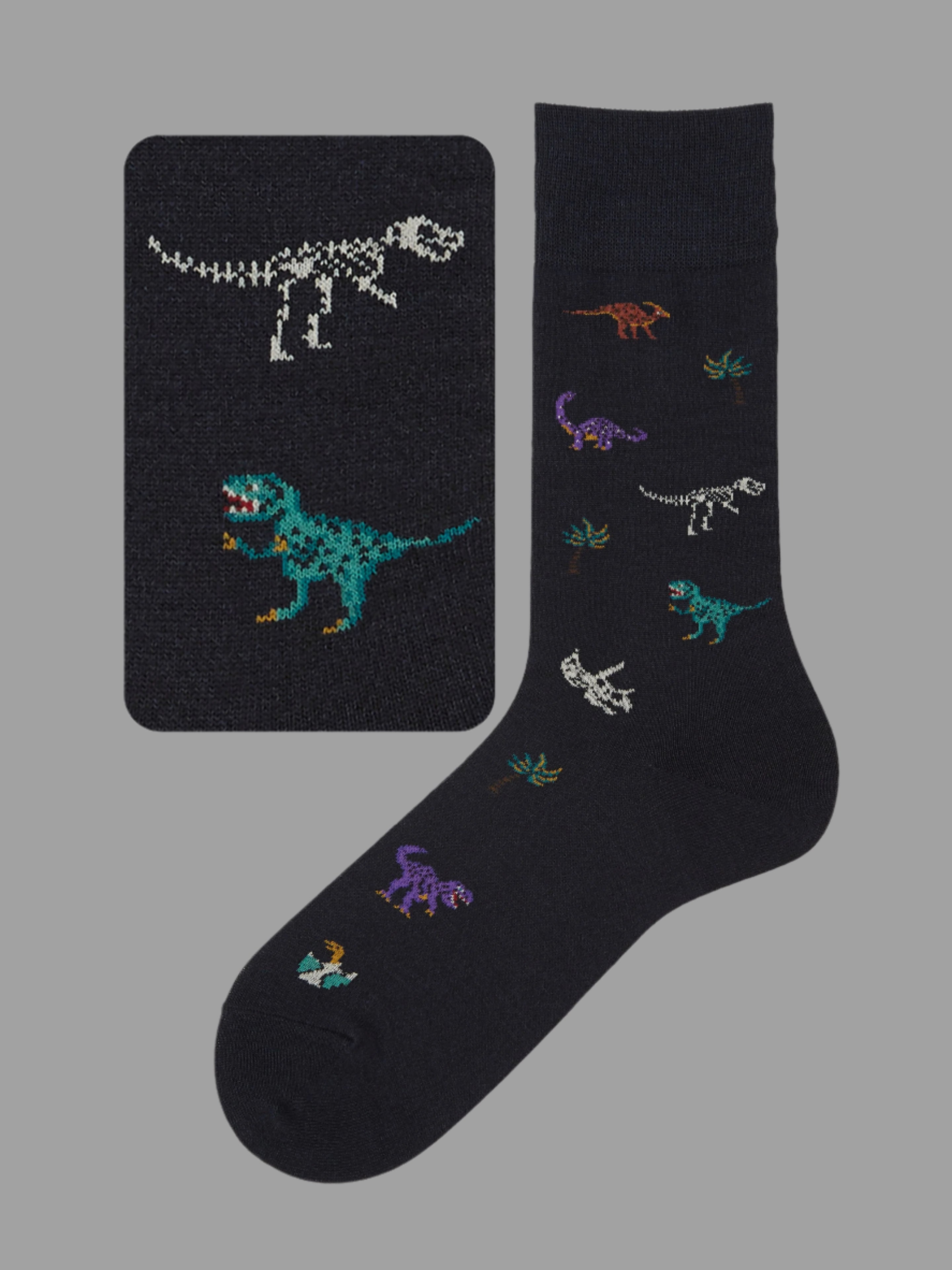 Tabio Dinosaur-Pattern Crew Socks featuring colorful dinosaur motifs, showcasing soft cotton texture and elegant crew style.