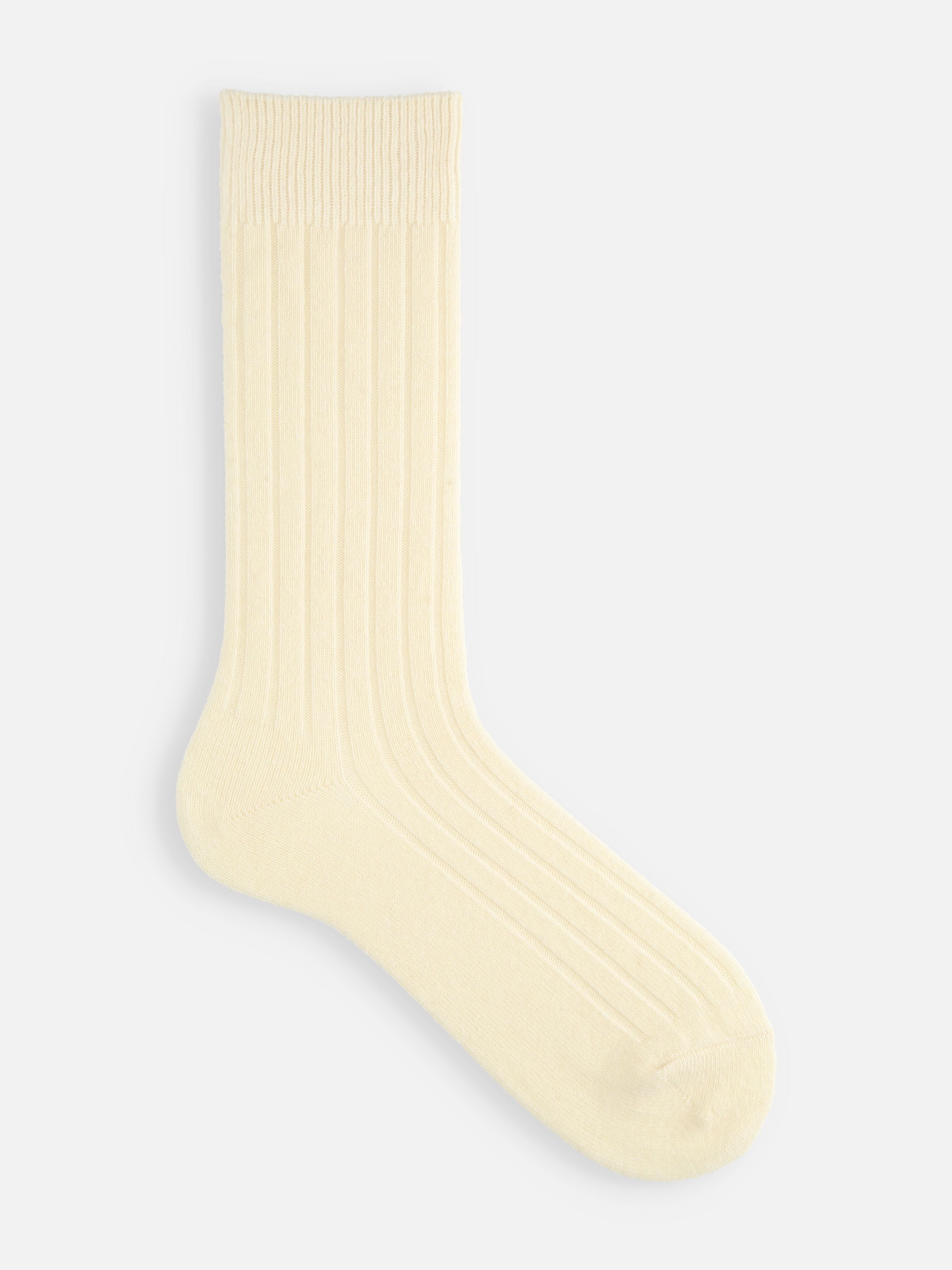 Tabio Merino Wool Ribbed Socks in soft ecru, showcasing a textured ribbed design for cozy, stylish wear in colder weather.