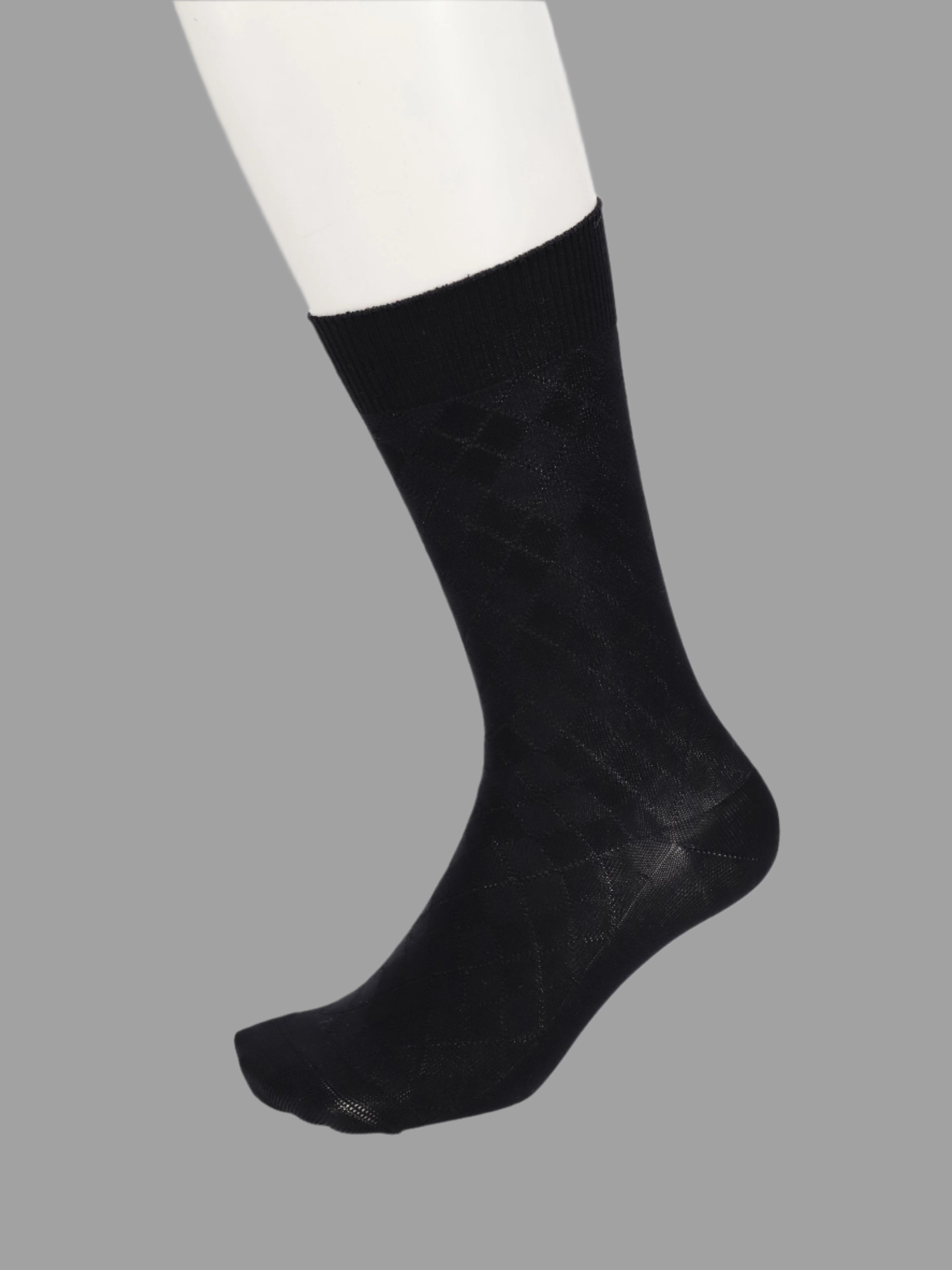 Tabio. Supima Cotton Diamond Crew Socks displayed on a model’s foot, showcasing the sleek diamond design in navy and grey.