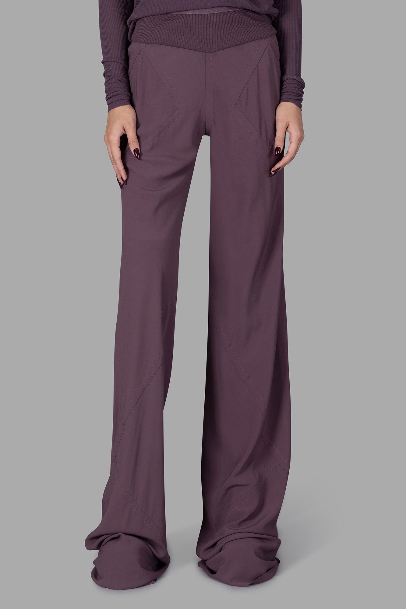Rick Owens Silk Bias-cut Trousers in mauve, featuring a loose fit, ribbed waistband, and elegant floor-length design.