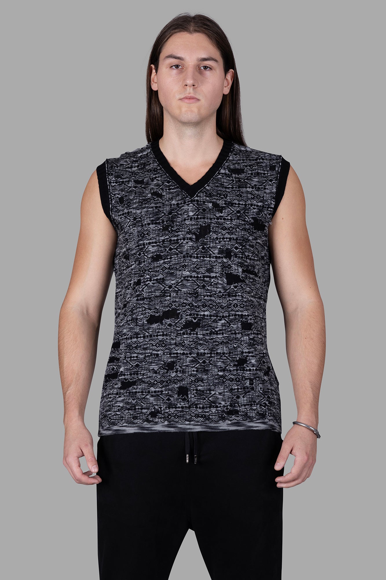 Marc Point Melange Sweater Vest in Black/Grey, sleeveless design on model, showcasing intricate wool texture and casual fit.