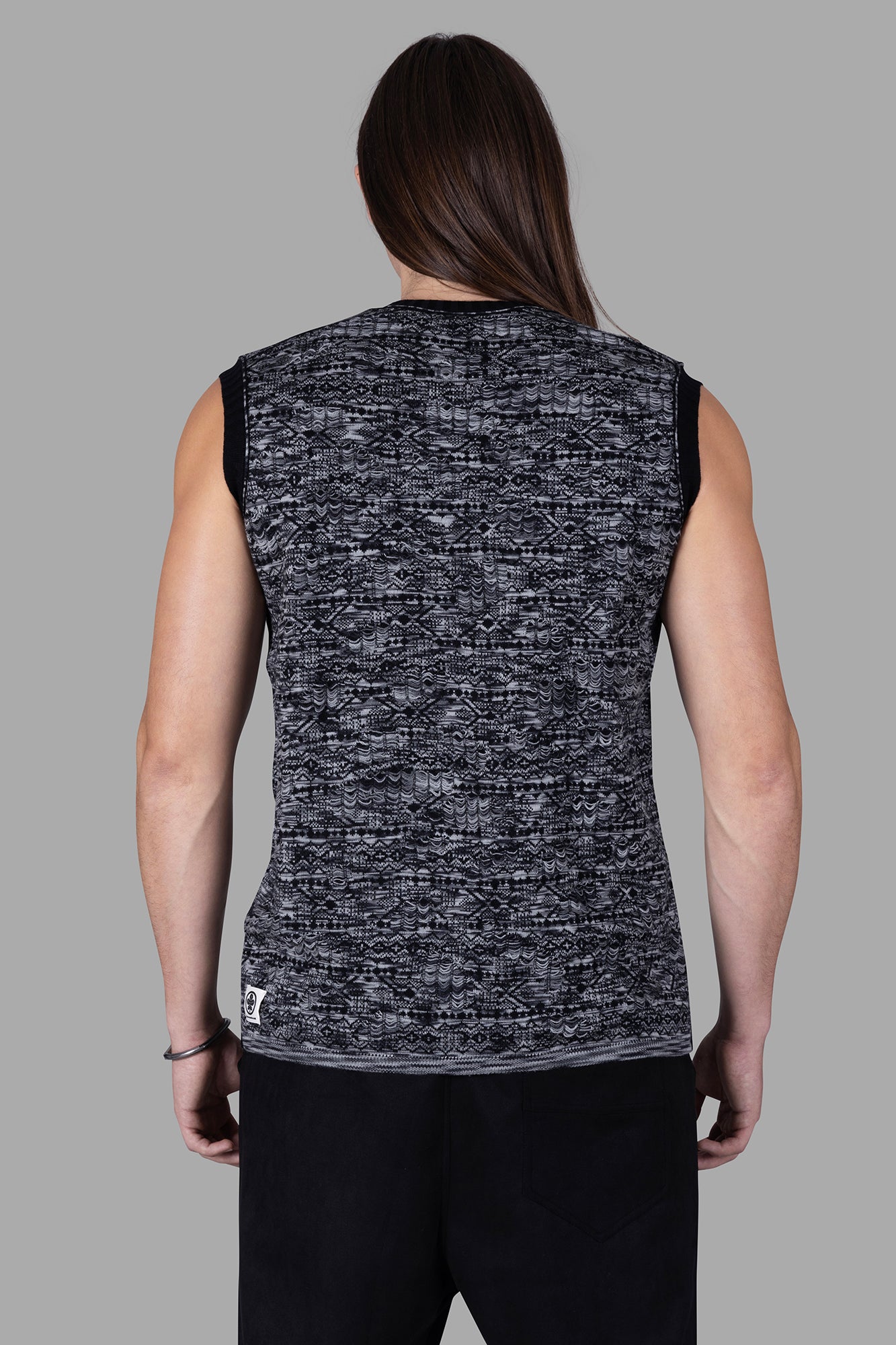 Marc Point Melange Sweater Vest in black/grey, showcasing the stylish back design on model, crafted from 100% wool.