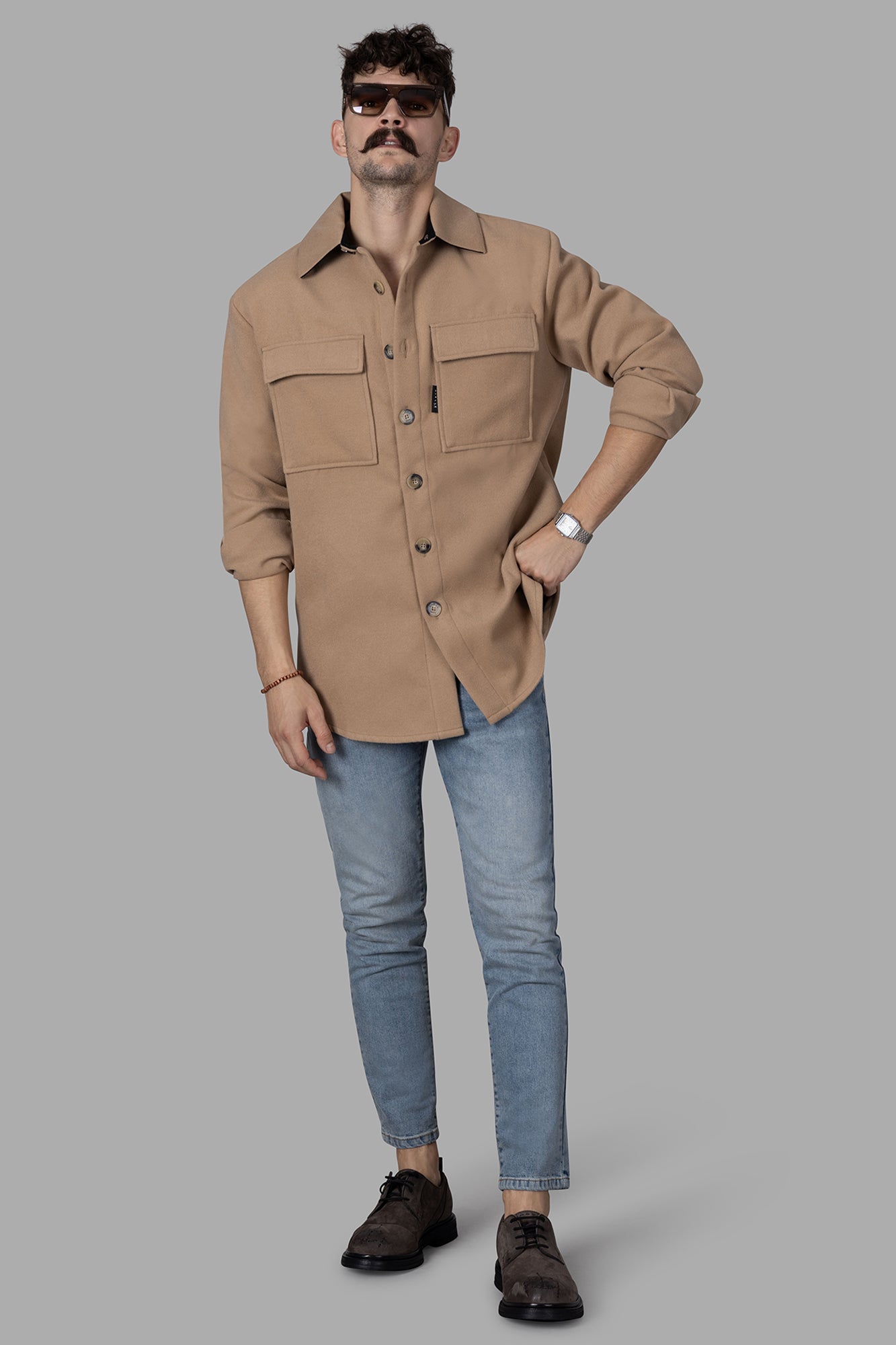 Gaëlle Paris Beige Shirt Jacket front view on model, styled with jeans and sunglasses.