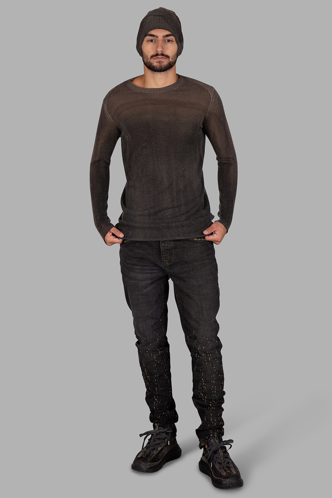 Masnada Ribbed-detail Sweater in moss on model, showcasing ombre wool texture and ribbed neckline and long sleeves.