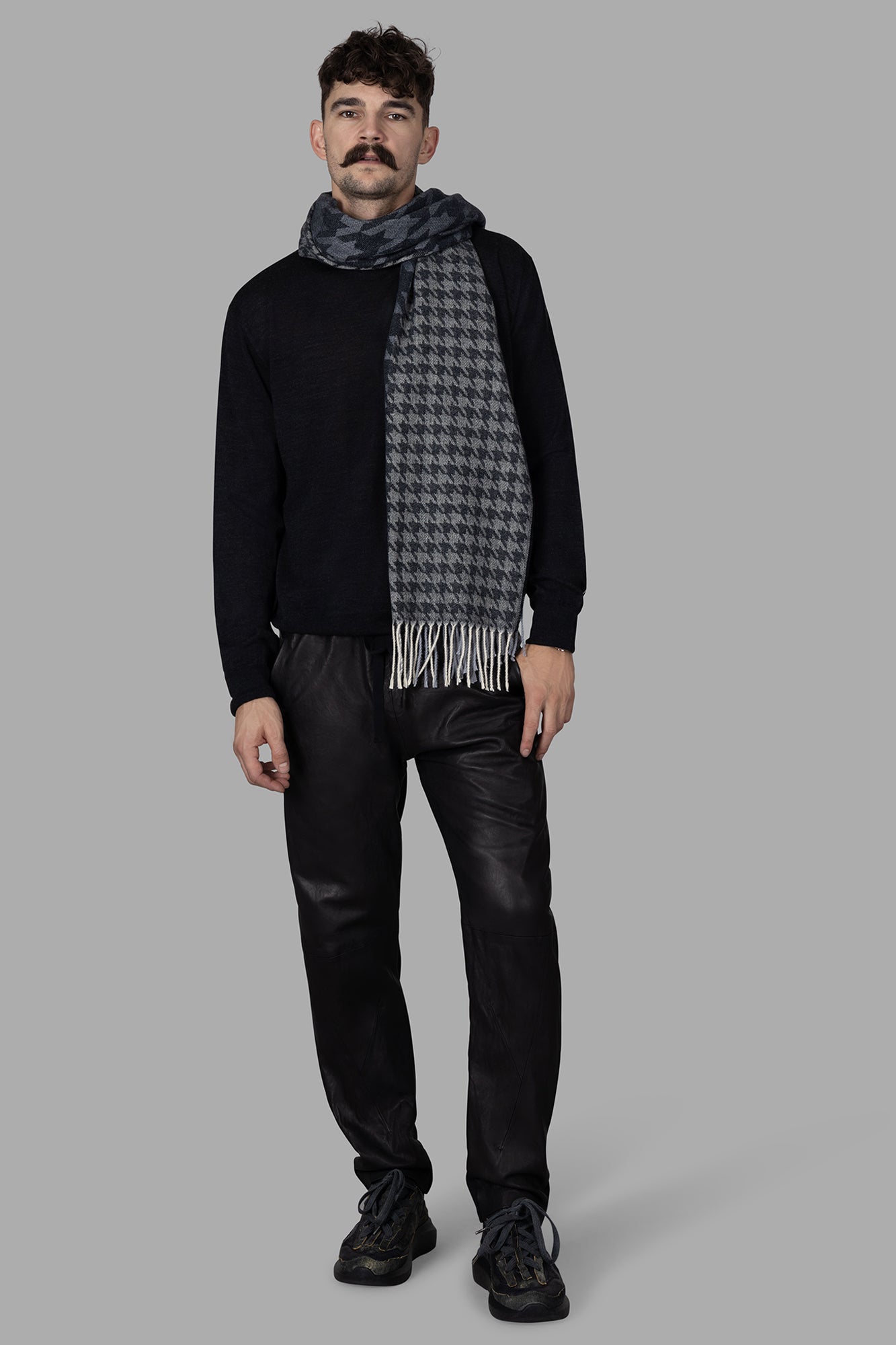 AION Fine-knit Turtleneck Sweater in antracite, front view on model with scarf, cozy 100% virgin wool.