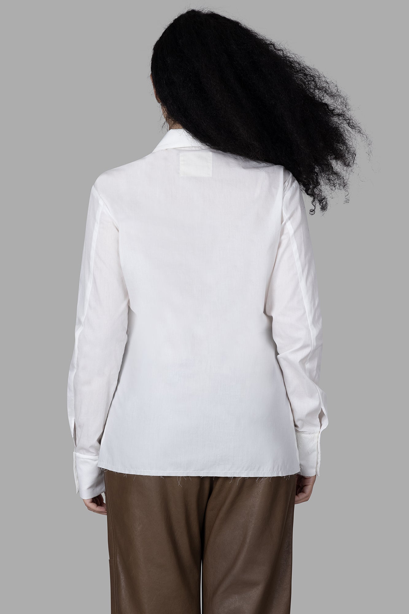 Marc Point Lace Shirt featuring a classic collar and elegant white lace detail, shown from the back on a model.