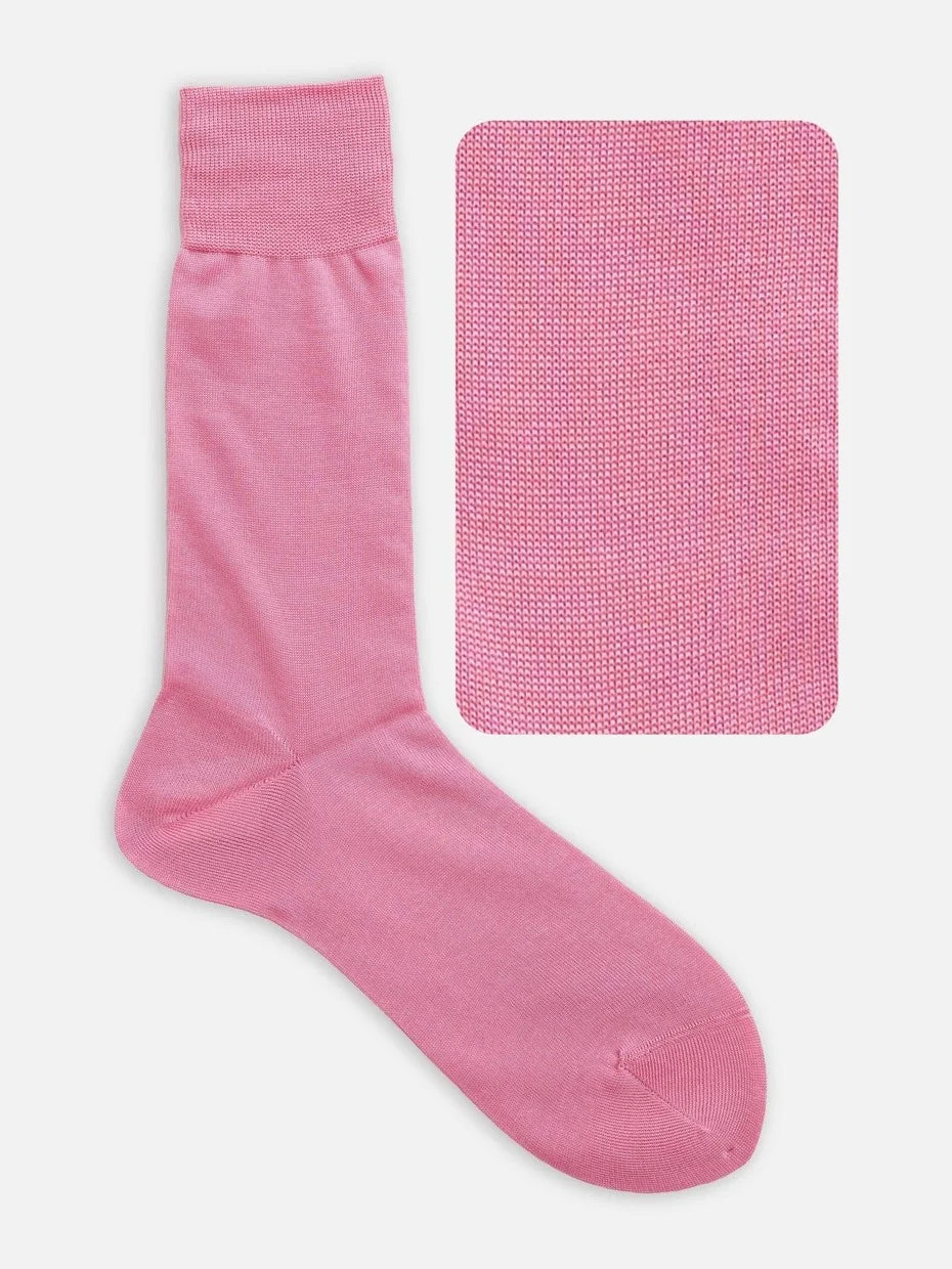 **Alt text:** Tabio Cotton Plain Mid-Calf Socks in pink, showcasing soft texture and hand-knit design for ultimate comfort.