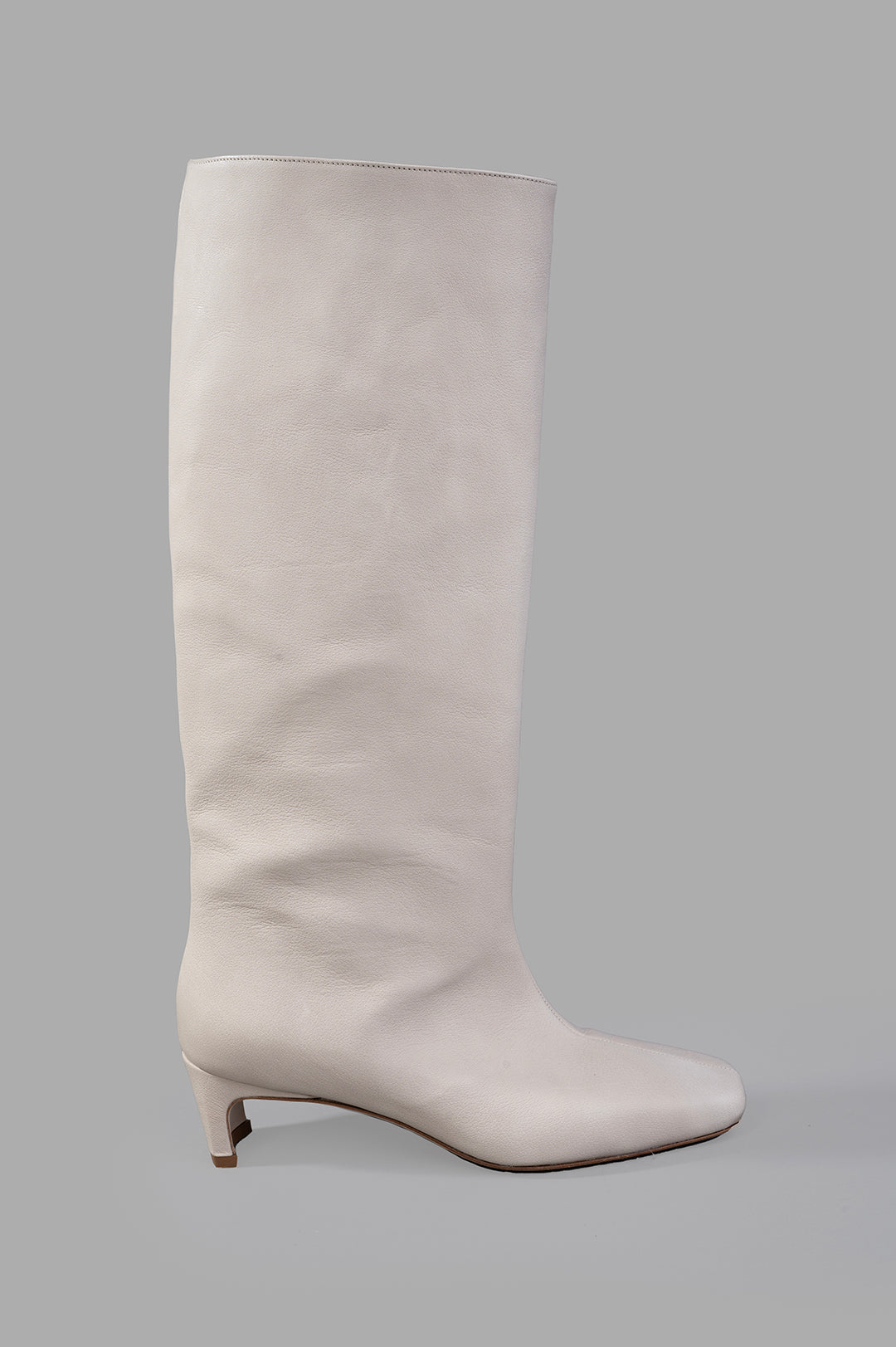 Gentry Portofino ecru square-toe boots side view, showcasing leather material and comfortable heel design.