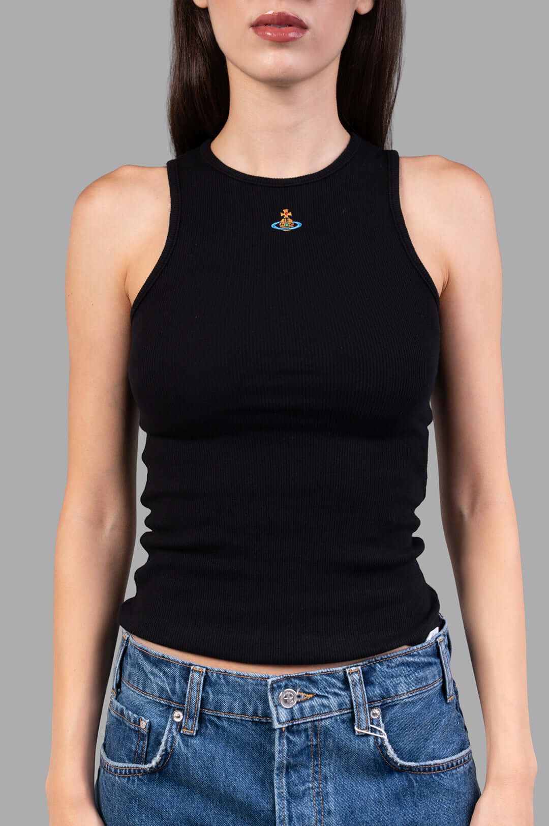 Vivienne Westwood 90s Vest in Black, on-model front view; ribbed tank with orb logo at chest, crew neck, styled with denim.