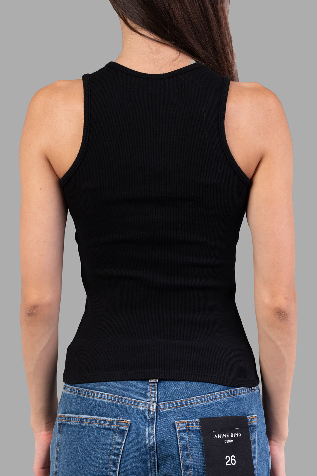 Vivienne Westwood 90s Vest in Black, on-model back view showing ribbed knit tank with racerback cut and fitted silhouette.