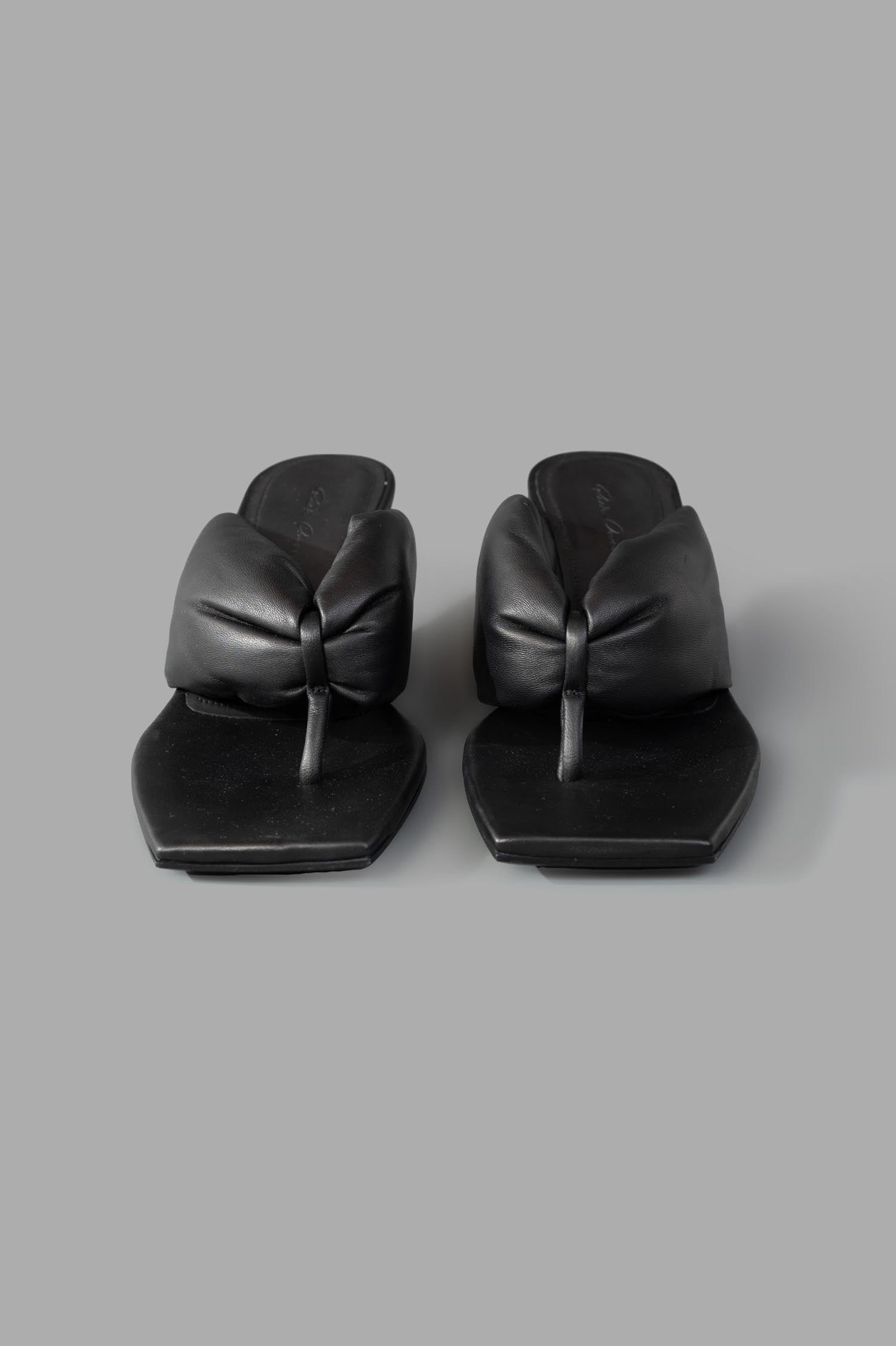 Rick Owens Hollywood Thong Cantilever, black leather slide sandals showcasing a padded strap and square toe design.