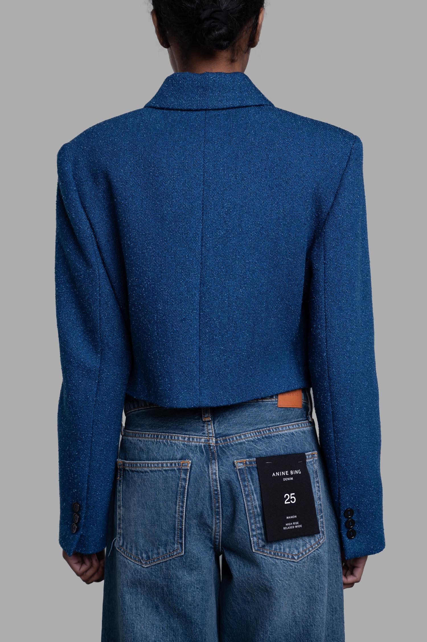 **MSGM Cropped Drawstring Blazer in blue, showcasing a back view with classic collar and textured fabric.**