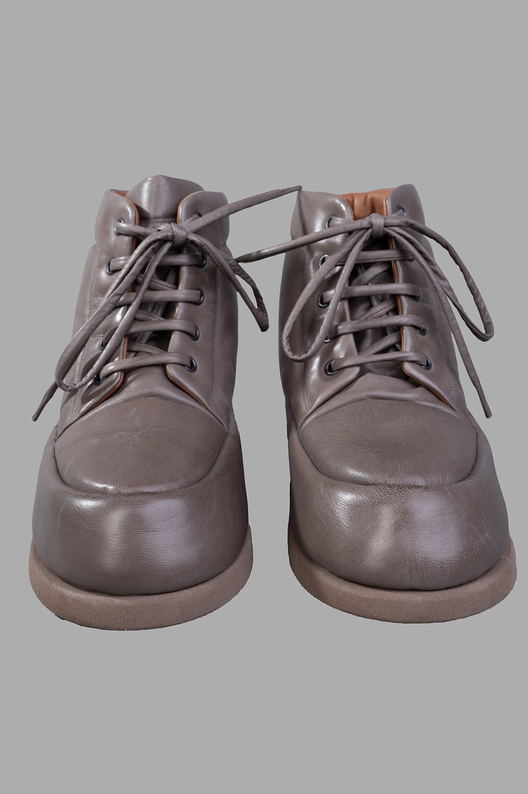 Marsèll Bombo Ankle Boots, front view showcasing soft leather and detailed laces. Stylish design for modern footwear lovers.