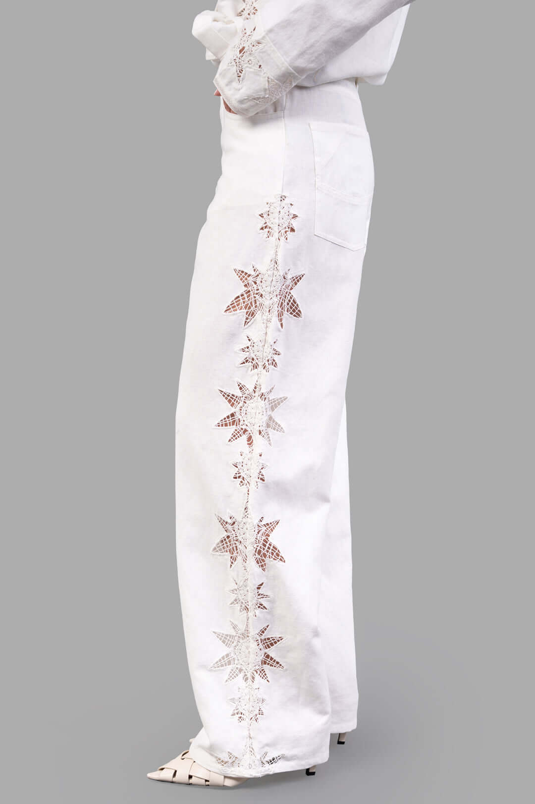 Zadig & Voltaire Elfy Cotton Wide-leg Pants showcasing side view with intricate embroidery detail and flowing silhouette.