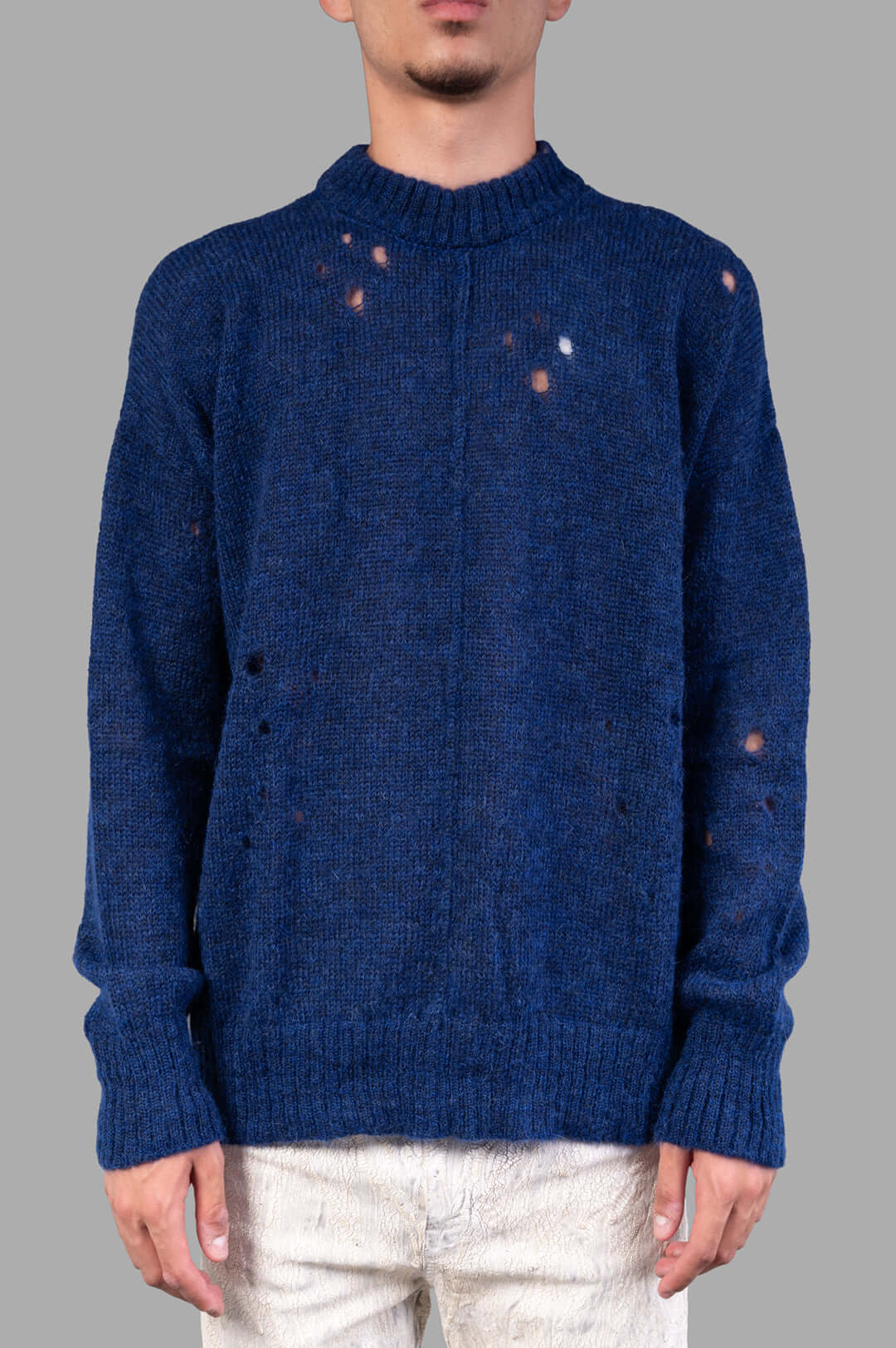 Marc Point Blue Sweater featuring distressed details, showcased on-model, highlighting its unique texture and style.