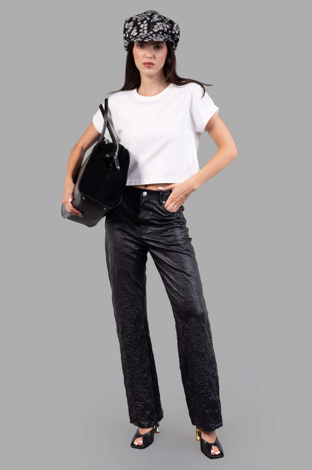Zadig & Voltaire Evy Leather Trousers on-model, black crinkled texture, front view, paired with casual white top.