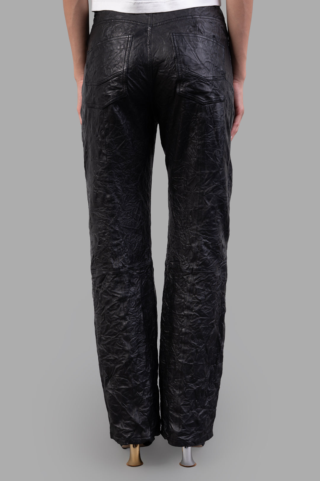 Zadig & Voltaire Evy Leather Trousers showcasing the back view of crinkled black leather with two patch pockets.