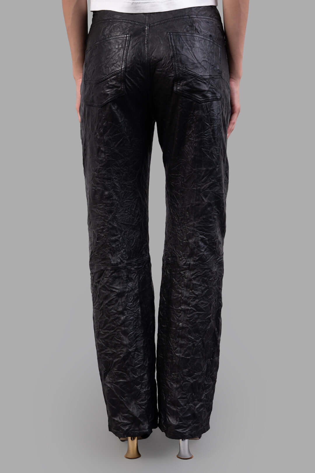 Zadig & Voltaire Evy Leather Trousers showcasing the back view of crinkled black leather with two patch pockets.
