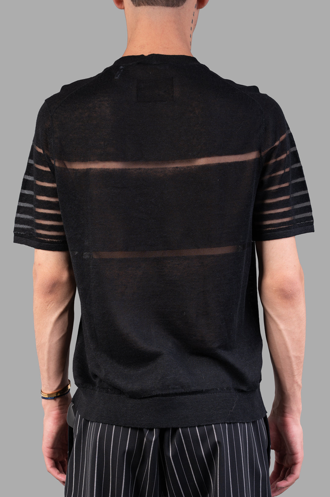 Vivienne Westwood Sheer Stripe Tee in Black, showcasing the back with sheer stripe details and lightweight linen texture.