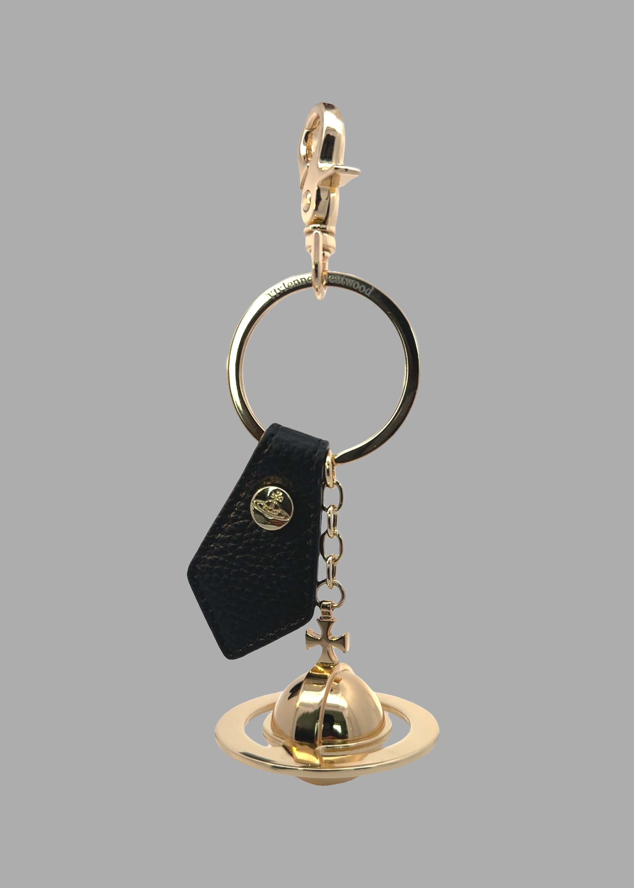 Vivienne Westwood 3D Orb Keyring in Gold, front view showing gold ring, orb charm, lobster clasp and black leather tag