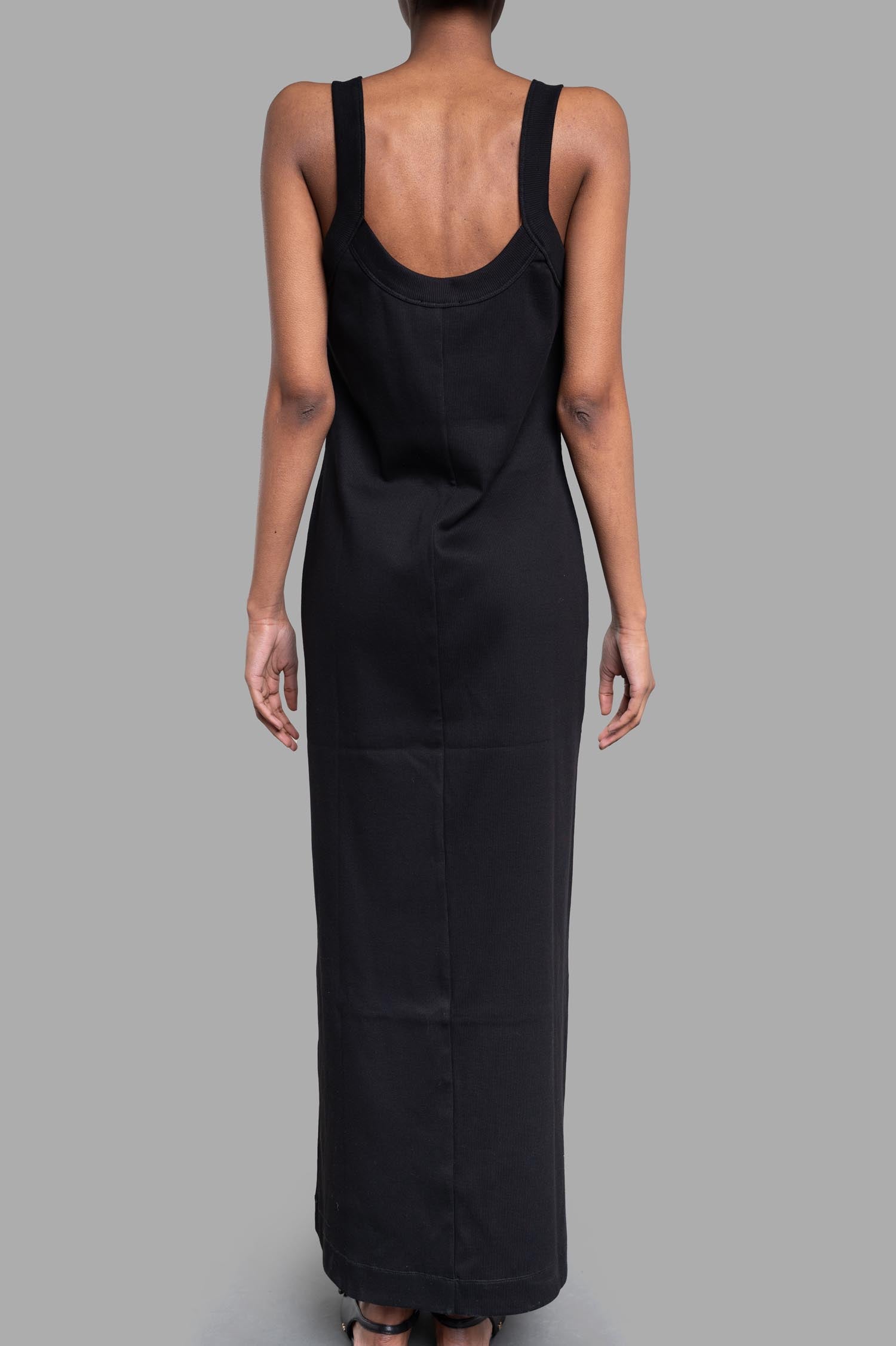 By Malene Birger Lio Maxi Dress, showcasing the back view with wide straps and straight silhouette in black organic cotton.