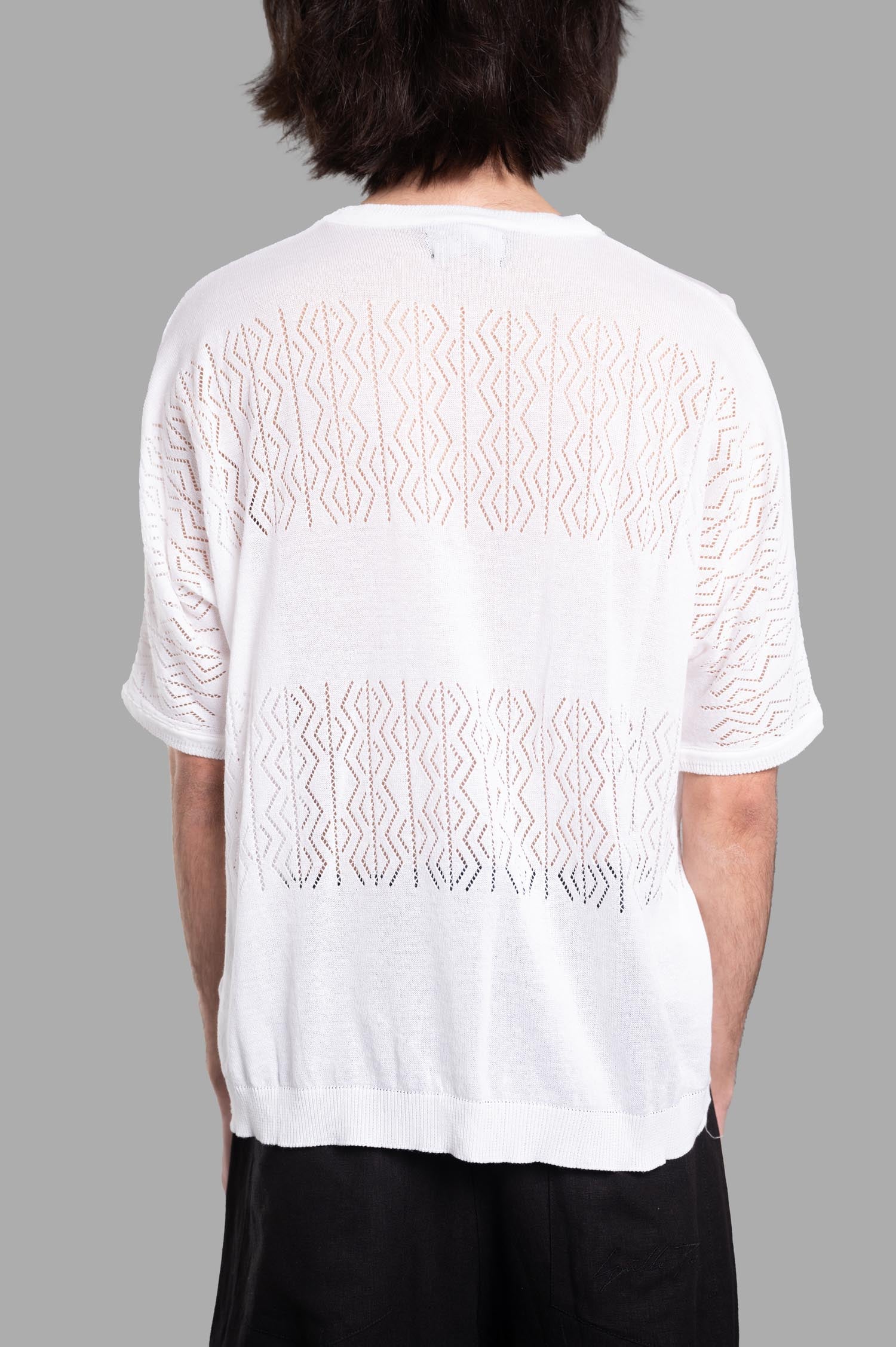 Gaëlle Paris Knit Logo T-shirt showcasing a detailed open knit pattern from the back, crafted from 100% cotton in white.