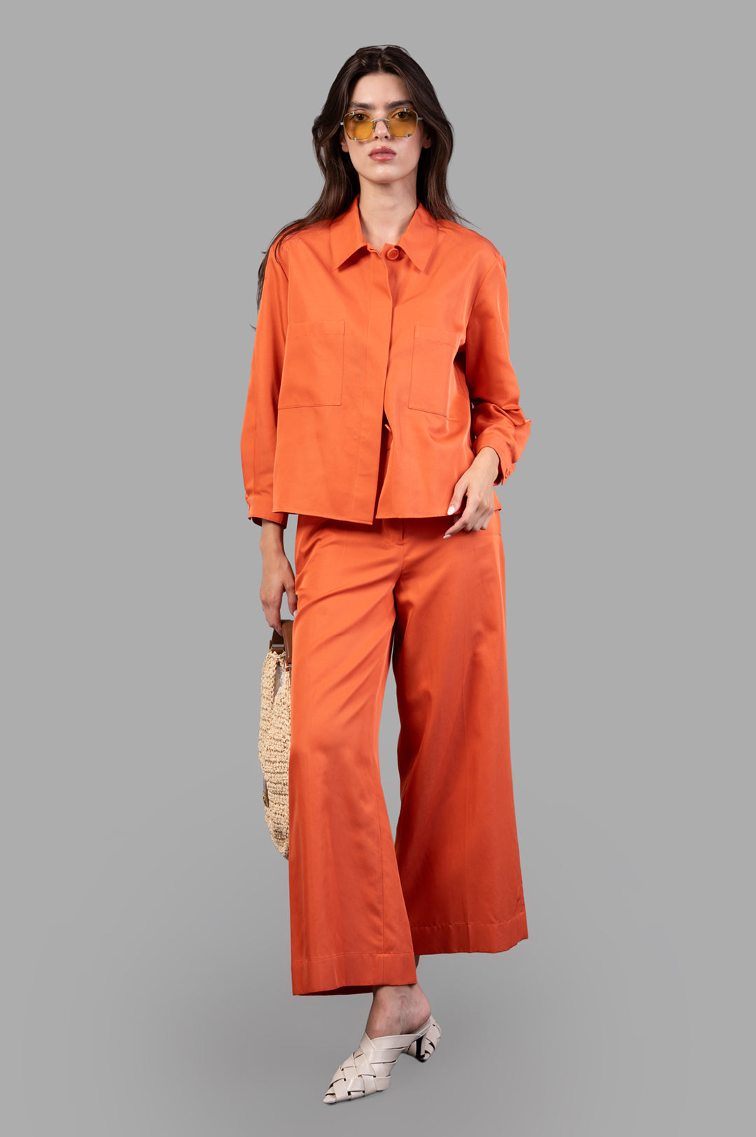 Joseph Soft Cotton Silk Shirt in orange, front view on model, featuring two front patch pockets and a relaxed fit.