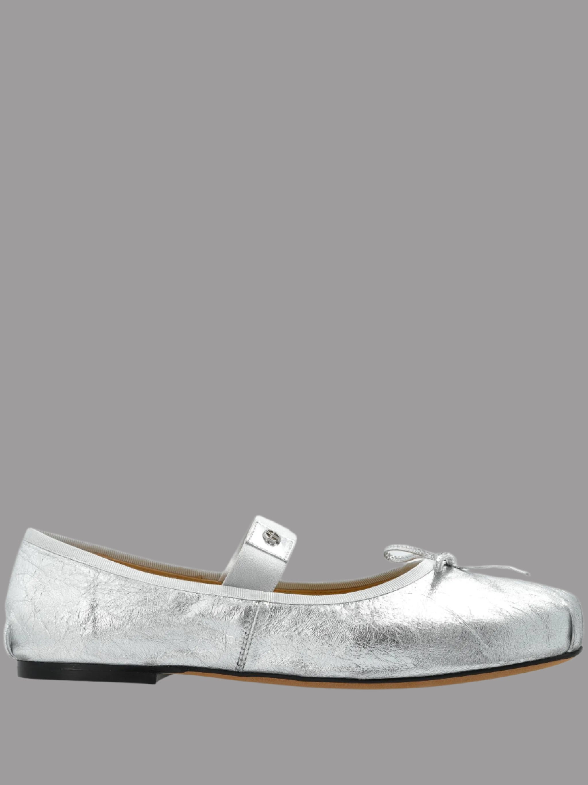 Anine Bing Jolie Flats side view, silver leather with elastic strap, bow detail, gold-tone hardware.