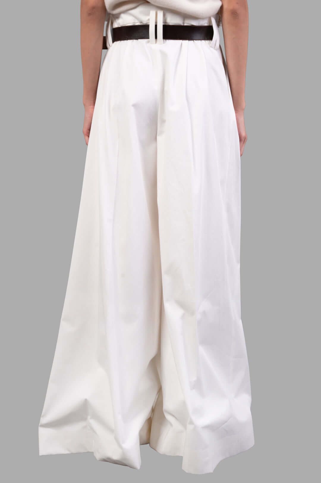A.W.A.K.E. MODE Split Cotton-poplin Trousers in white, showcasing the pleated waist and adjustable belt from the back.