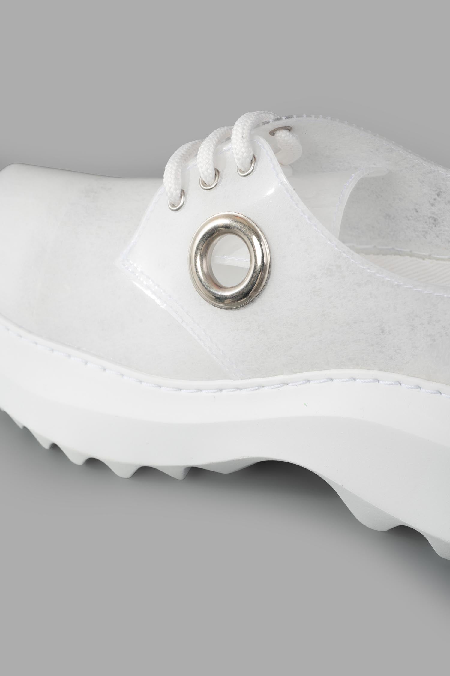 Comme des Garçons x Phileo 062 Derby Shoes featuring a close-up of clear rubber design with silver eyelet detail.