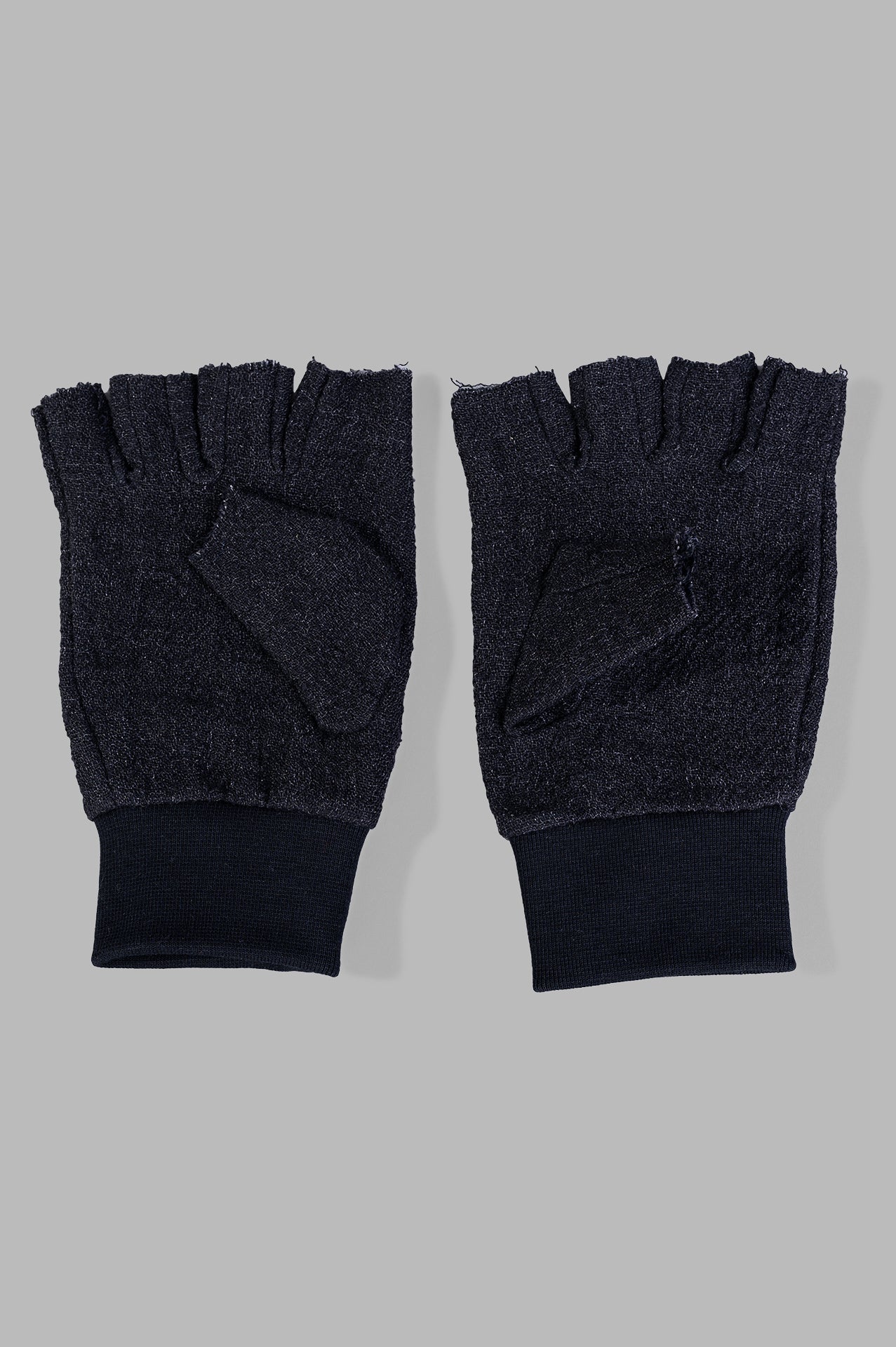 Marc Point Fingerless Gloves in black with ribbed cuffs, showcasing texture and design details from the front view.