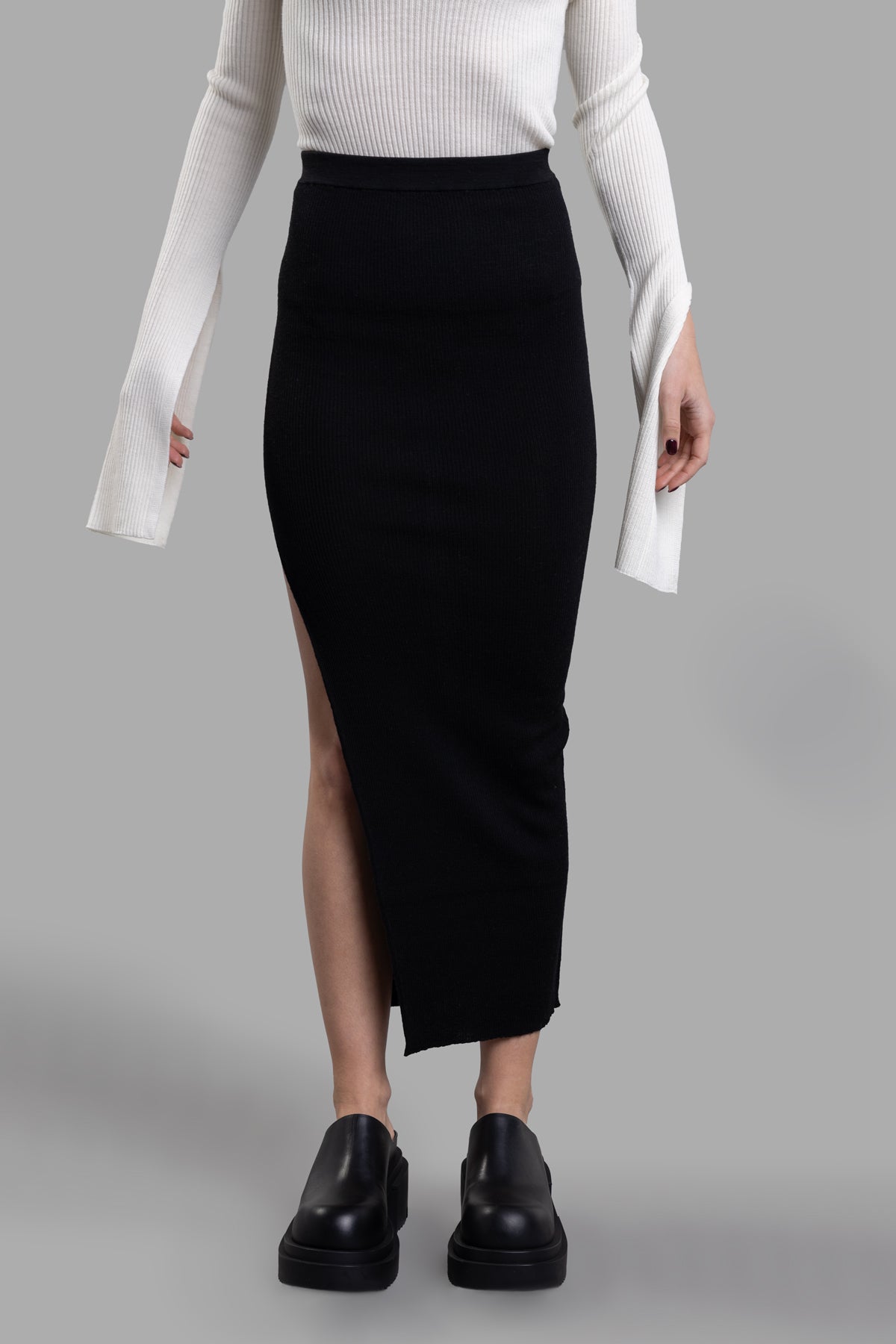 Rick Owens Ziggy Skirt features a floor-length design with a knit waistband and a side split above the knee, shown on model.