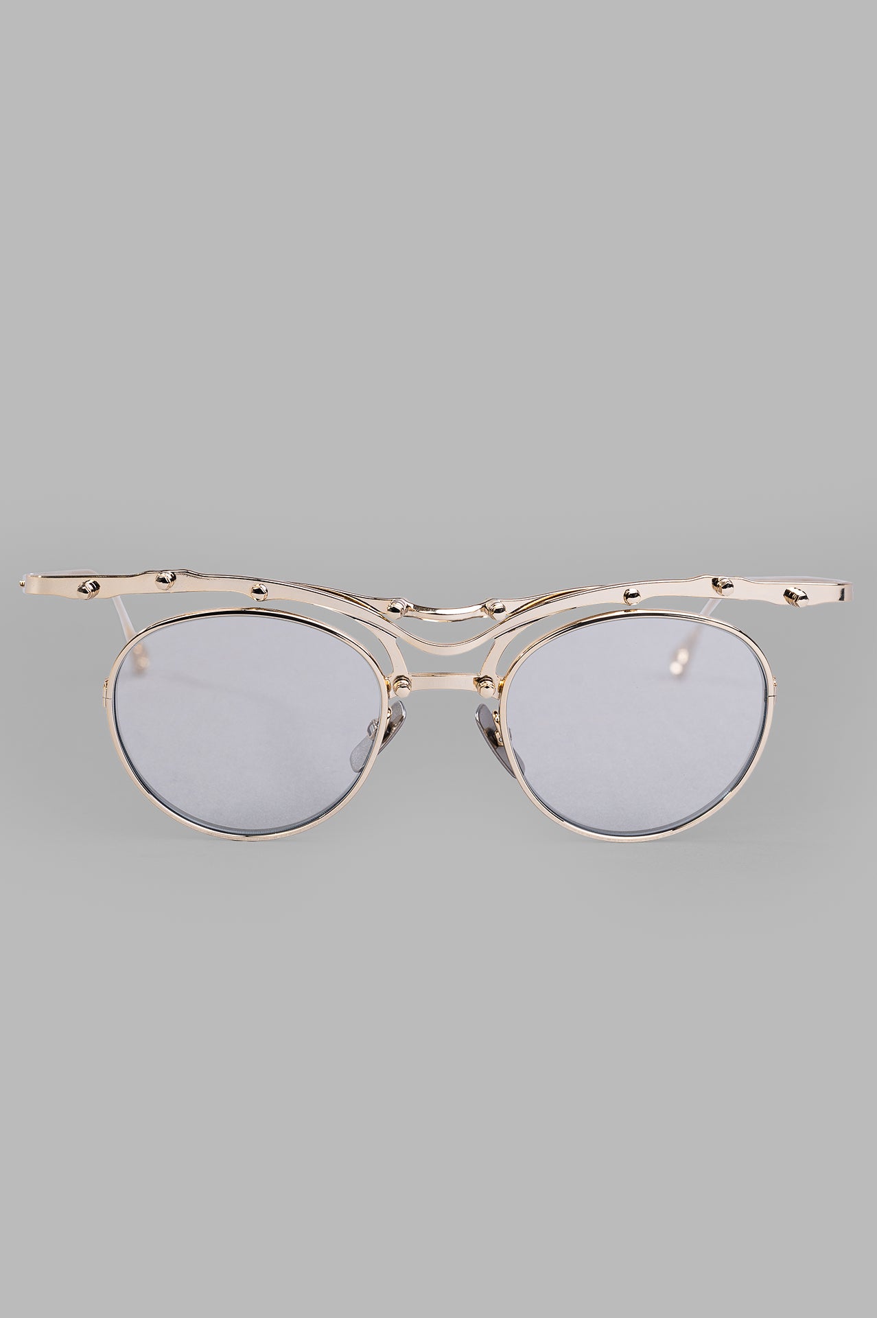 Innerraum Eyewear Object OJ1, front view, gold metal frame with mirror silver lenses.