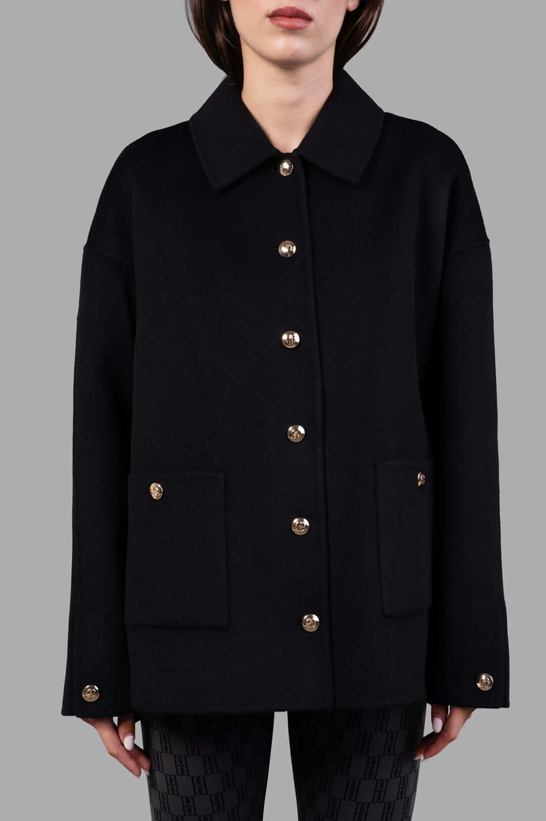 Anine Bing Luca Jacket in Black Cashmere, front view showcasing gold buttons and utility-inspired design details.