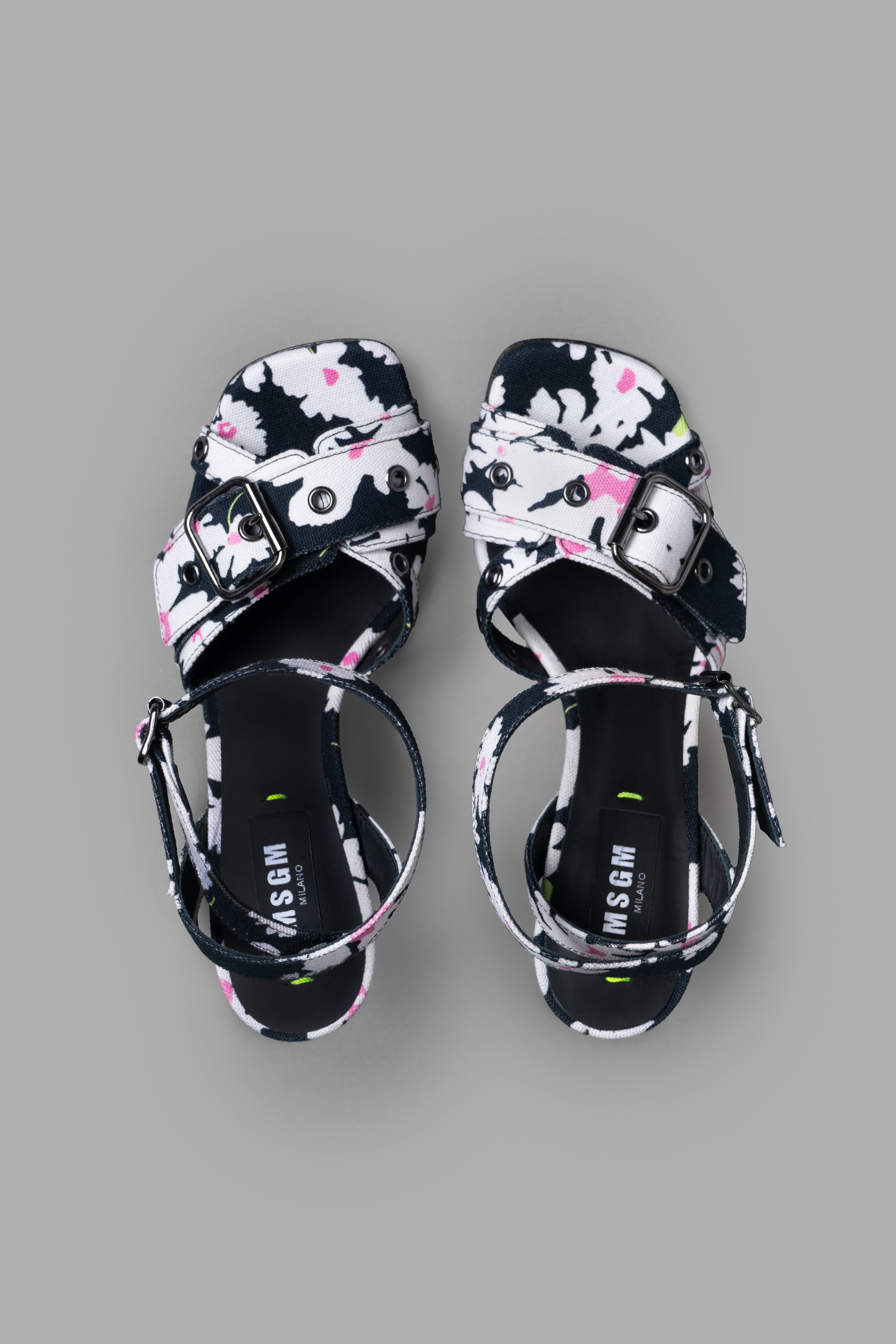 MSGM Floral-print Sandals featuring a stylish black floral print, crossover straps, and a high stiletto heel.