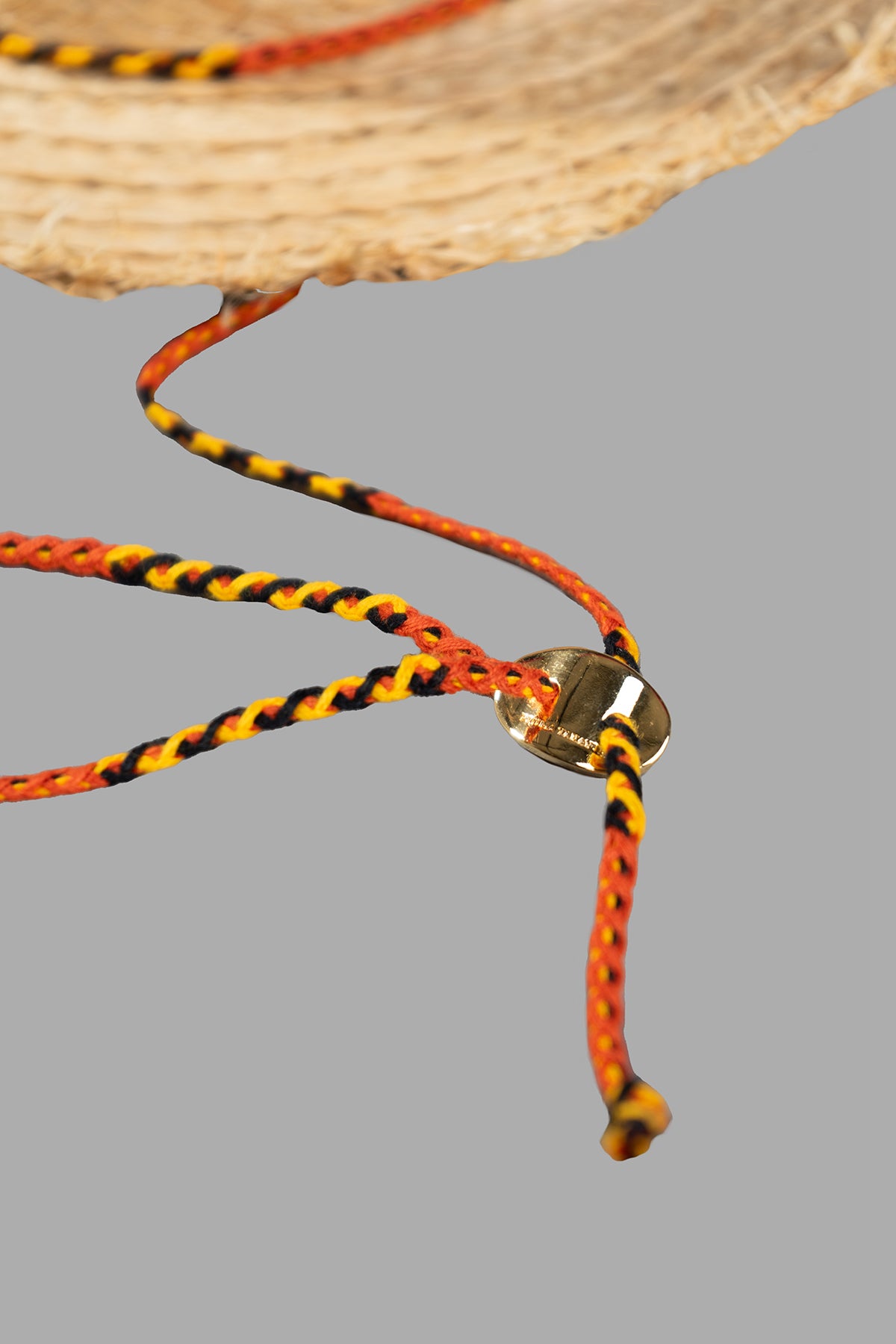 Kijima Takayuki Straw Boater Hat close-up of the colorful tie closure; crafted from 100% raffia for a stylish look.