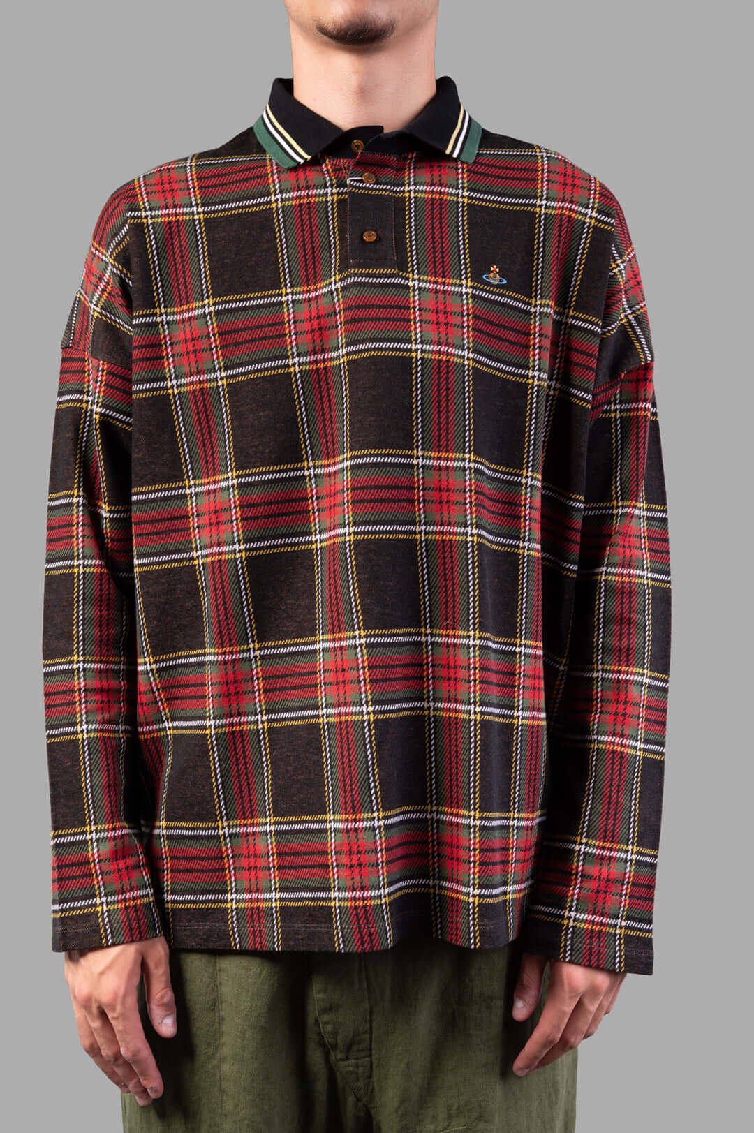 Vivienne Westwood Long-Sleeve Tartan Polo Shirt featuring a dark red tartan pattern, long sleeves, and button detail on.