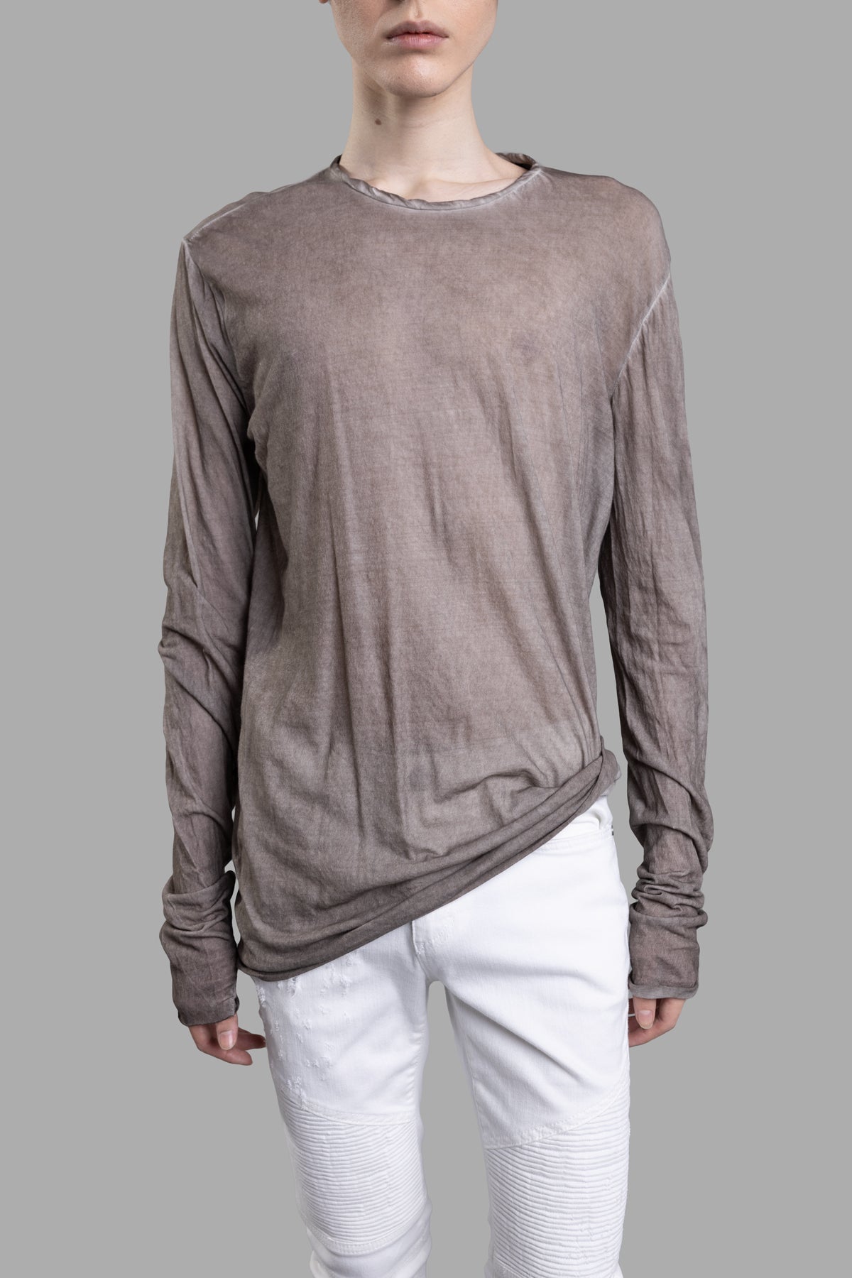 MD 75 Taupe Blouse shown front, featuring long sleeves, round neckline, and soft, sheer cotton fabric.