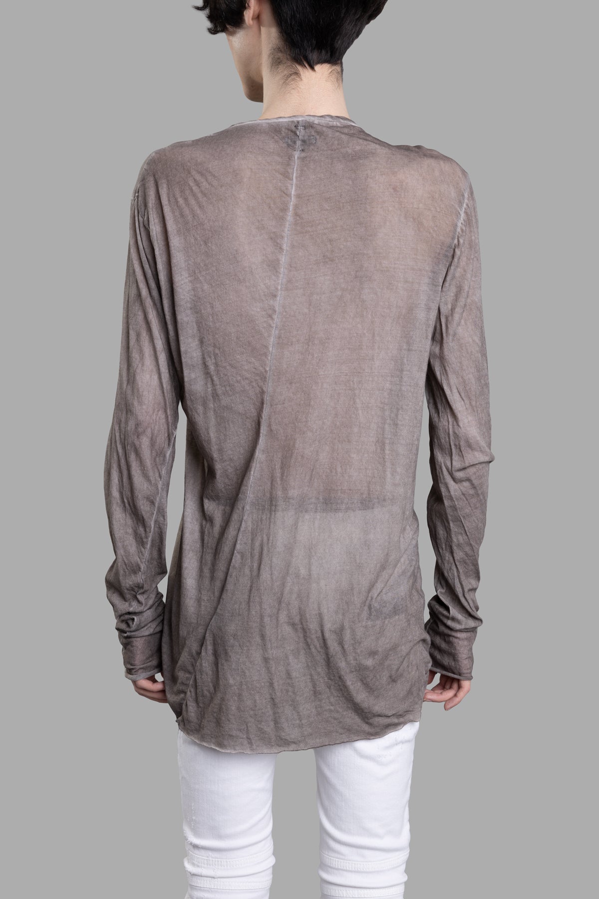 MD 75 Taupe Blouse shows the back view, featuring a partially see-through design and soft, lightweight texture.