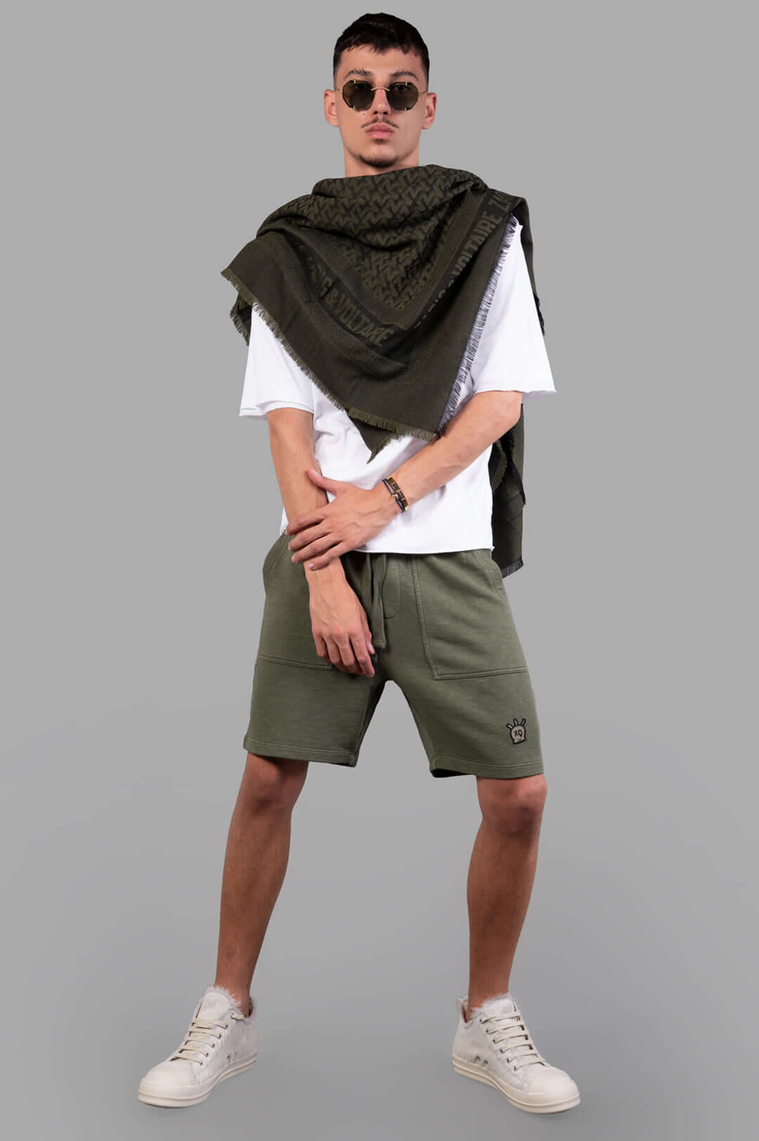 Zadig & Voltaire khaki Pablo Slub Shorts on model, featuring elastic waistband and side pockets, casual street style.