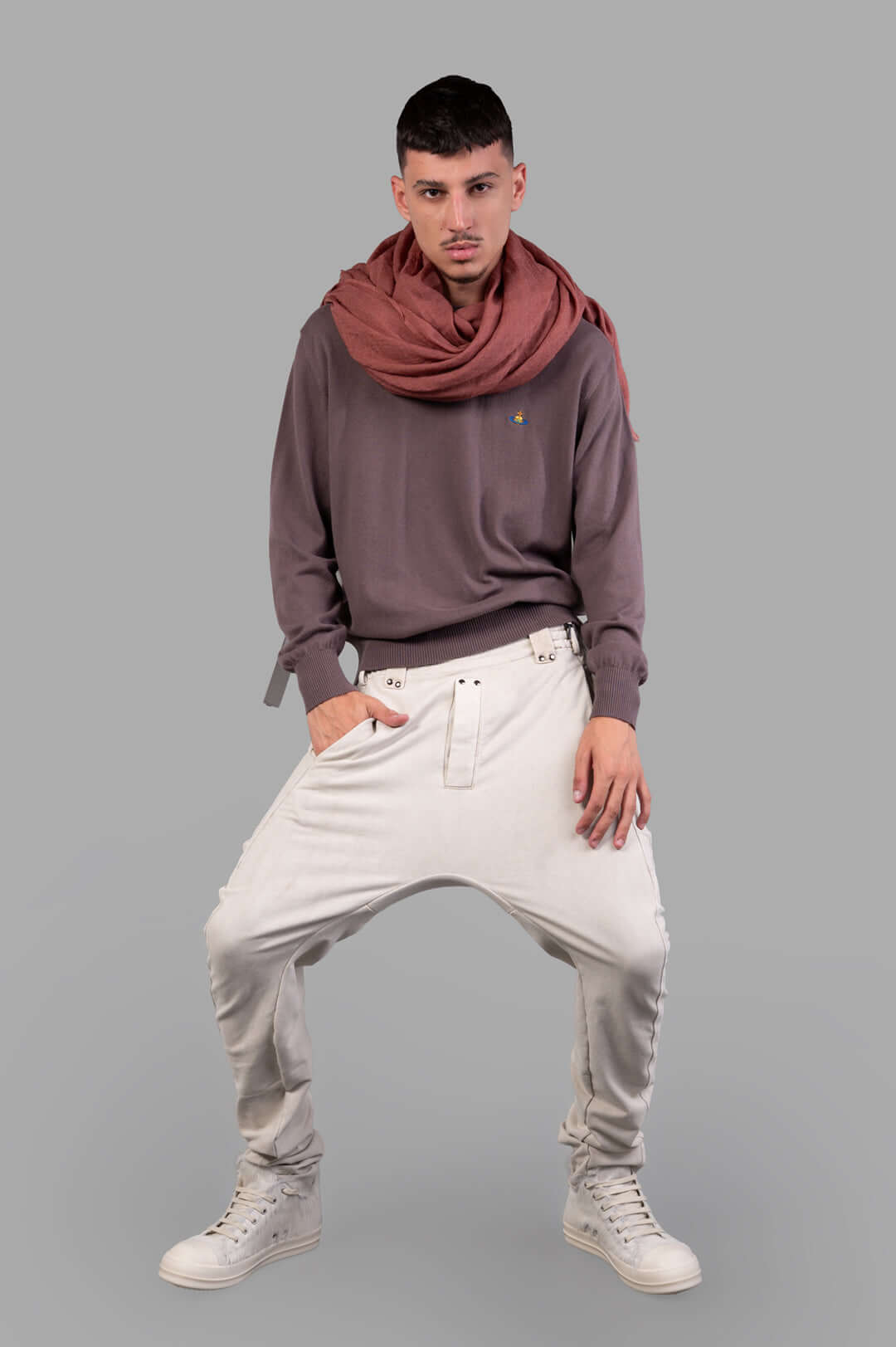Vivienne Westwood Orb-embroidered Jumper in Truffle on model, showcasing rib-knit details and relaxed fit with a scarf.