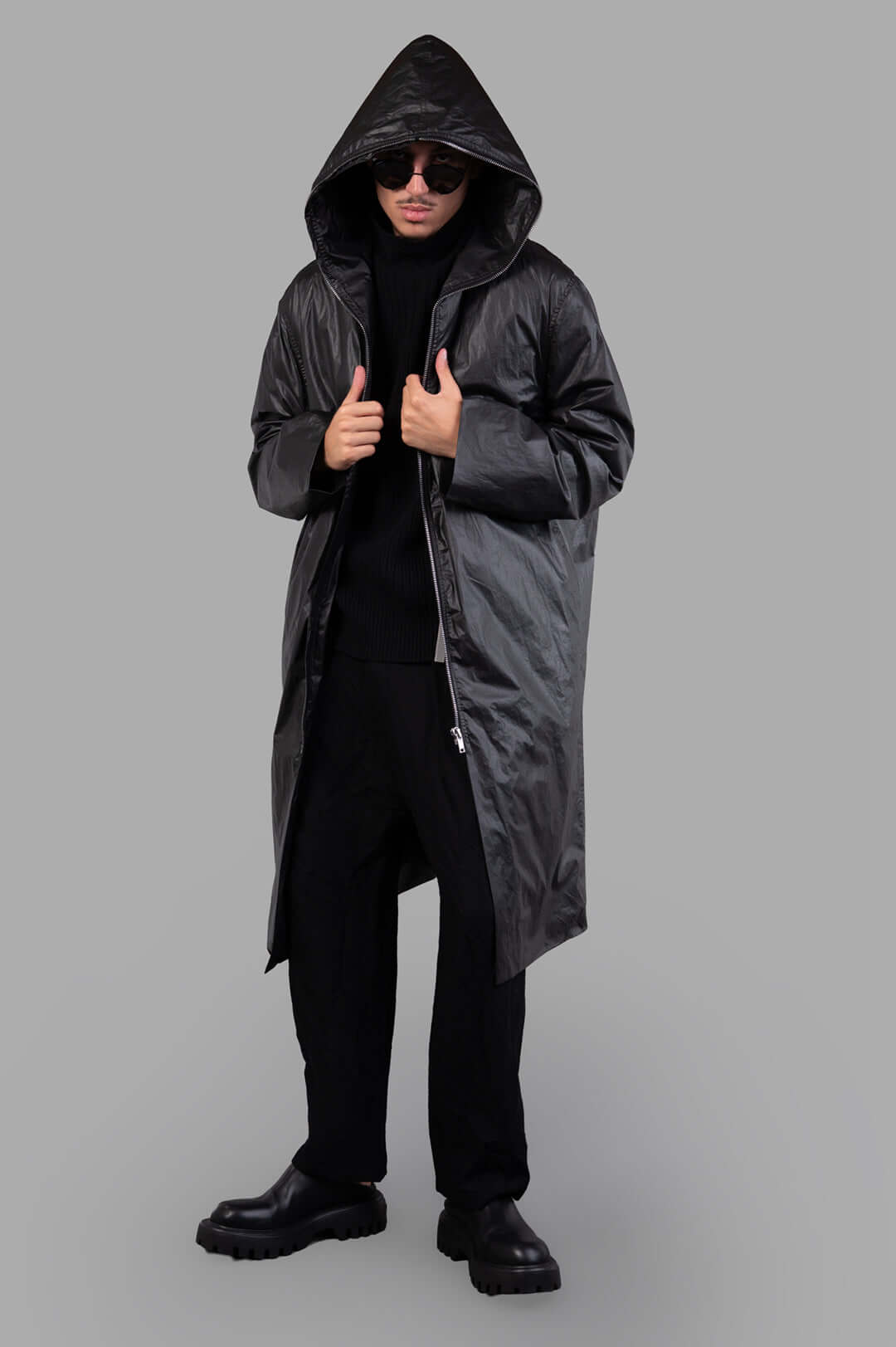 Rick Owens Concordians Gimp Mac in Black, on-model front view, hooded coat, knee-length, large hood, sleek design.